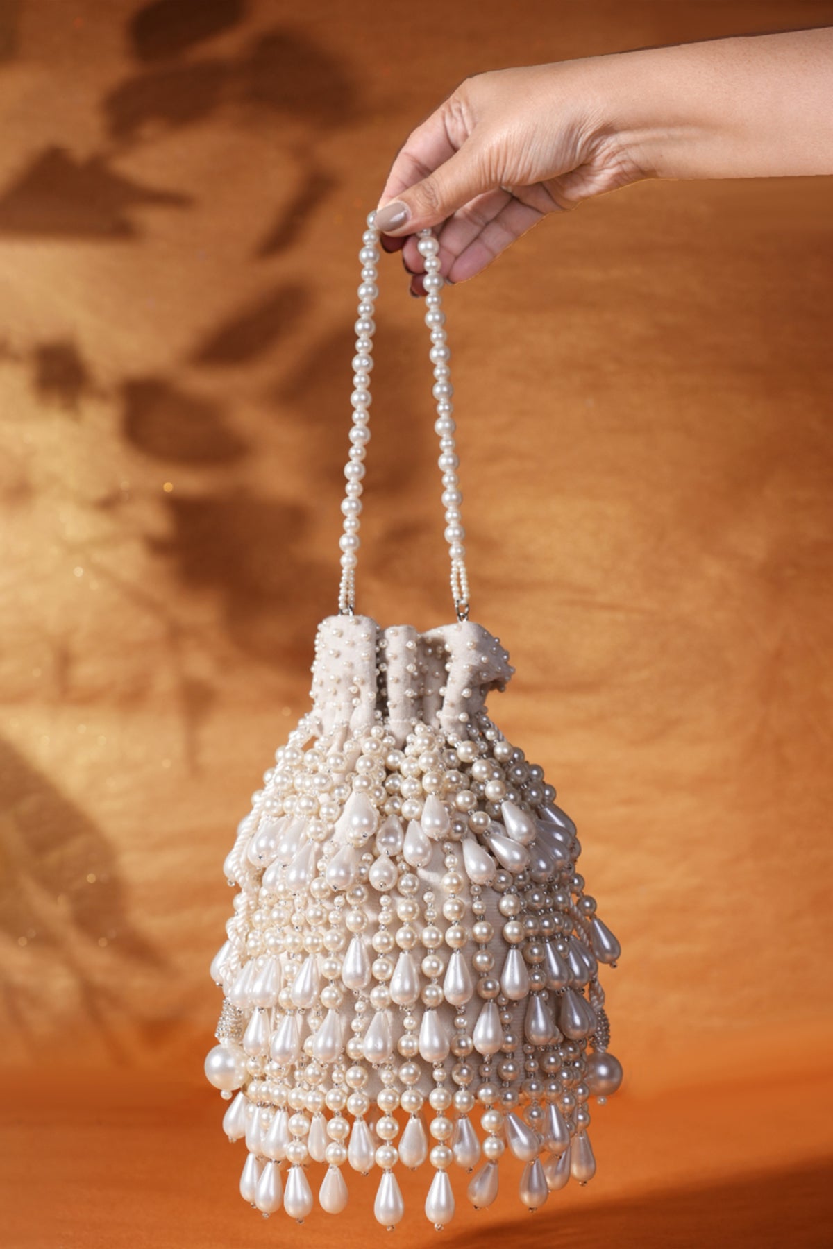 Zarah Ivory Pearl Suede Bucket Bag