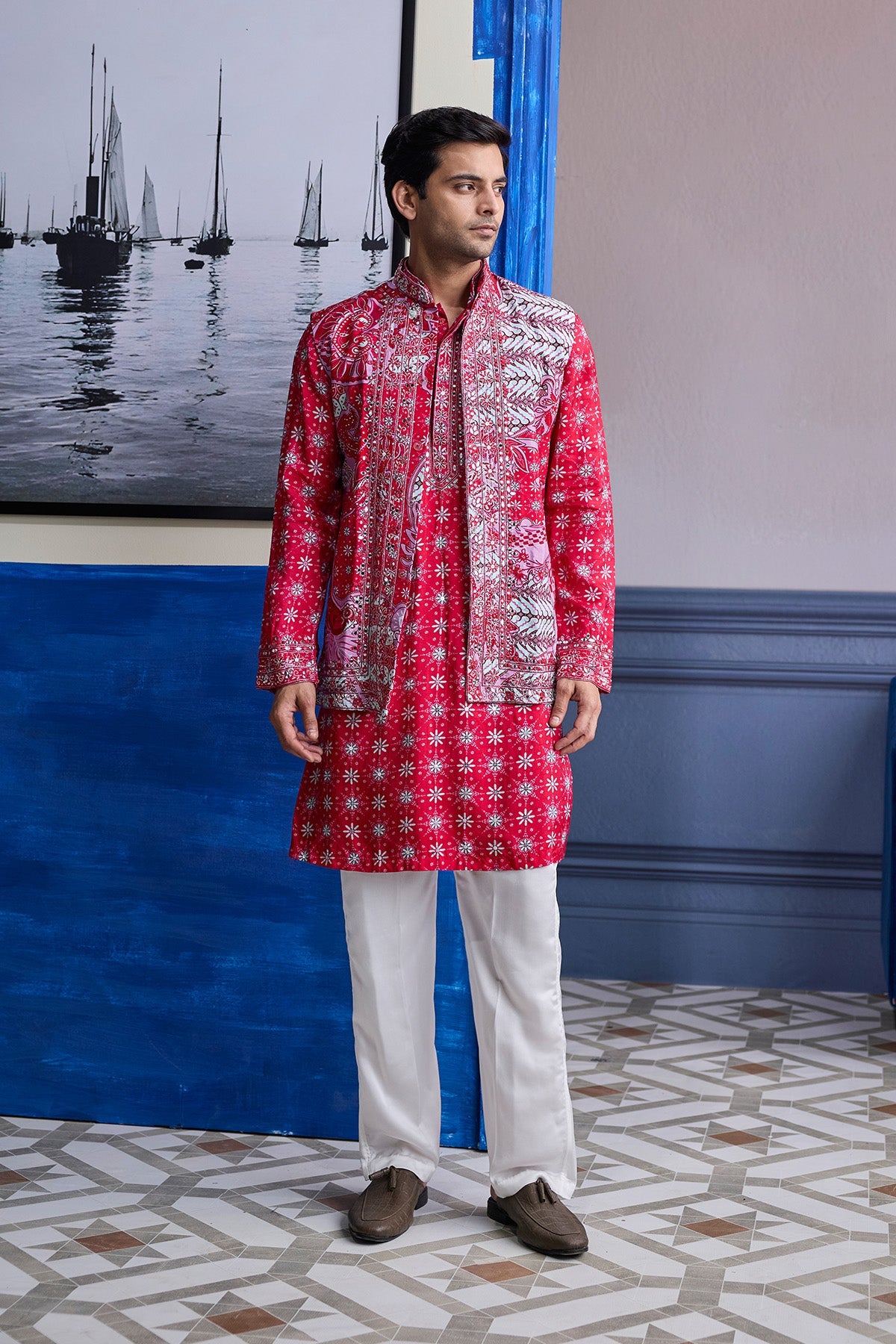 RED PRINT HIGHLIGHTED KURTA WITH PRINT EMBROIDERED BUNDI AND IVORY PANTS