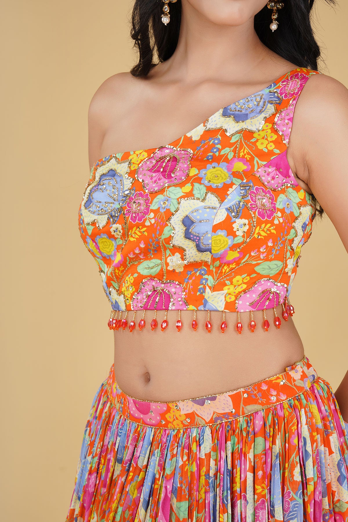 ORANGE JAAL HIGHLIGHTED AND PRINTED LEHENGA SET