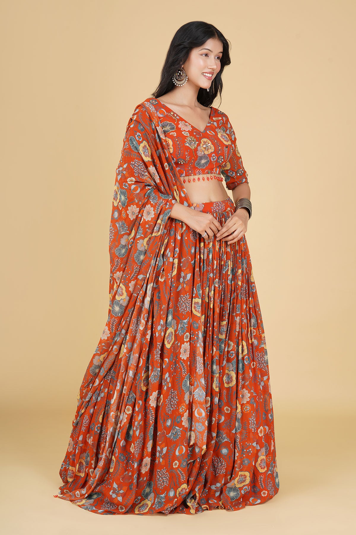 RUST ORANGE JAAL HIGHLIGHTED AND PRINTED LEHENGA SET