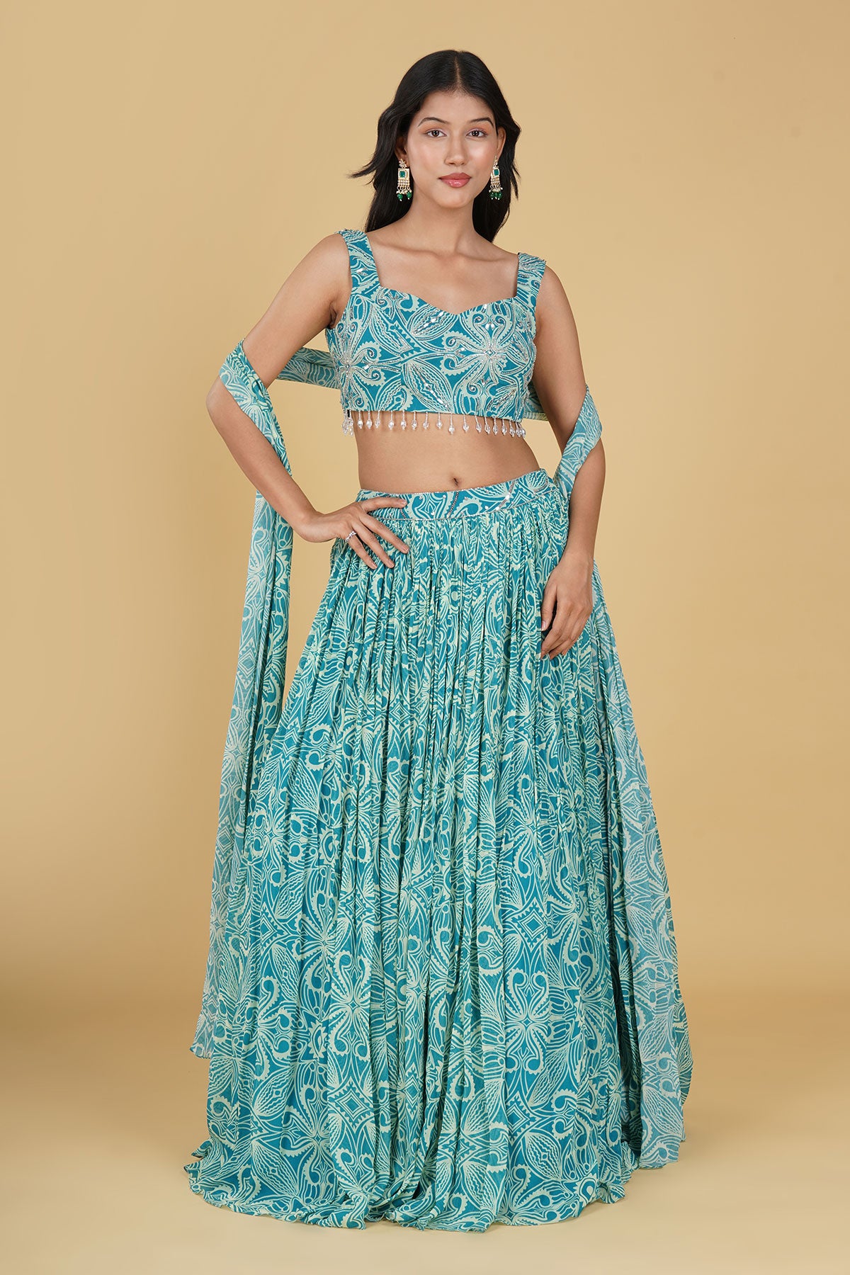 TURQUOISE JAAL HIGHLIGHTED AND PRINTED LEHENGA SET