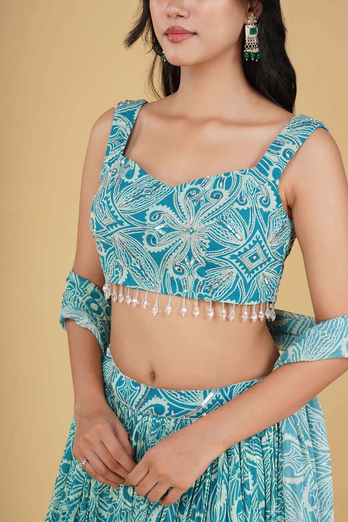 TURQUOISE JAAL HIGHLIGHTED AND PRINTED LEHENGA SET