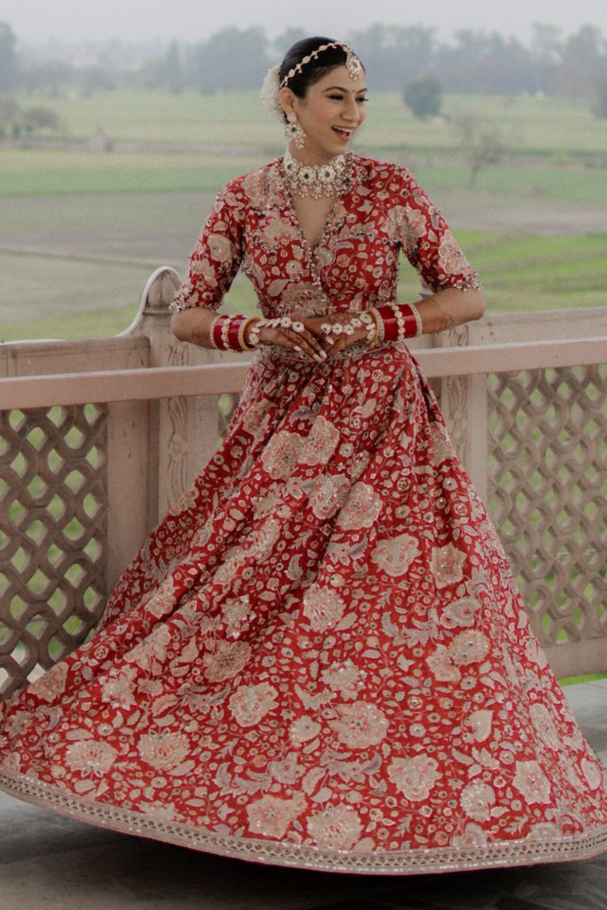 SWASTIKA IN STARLET LEHENGA SET