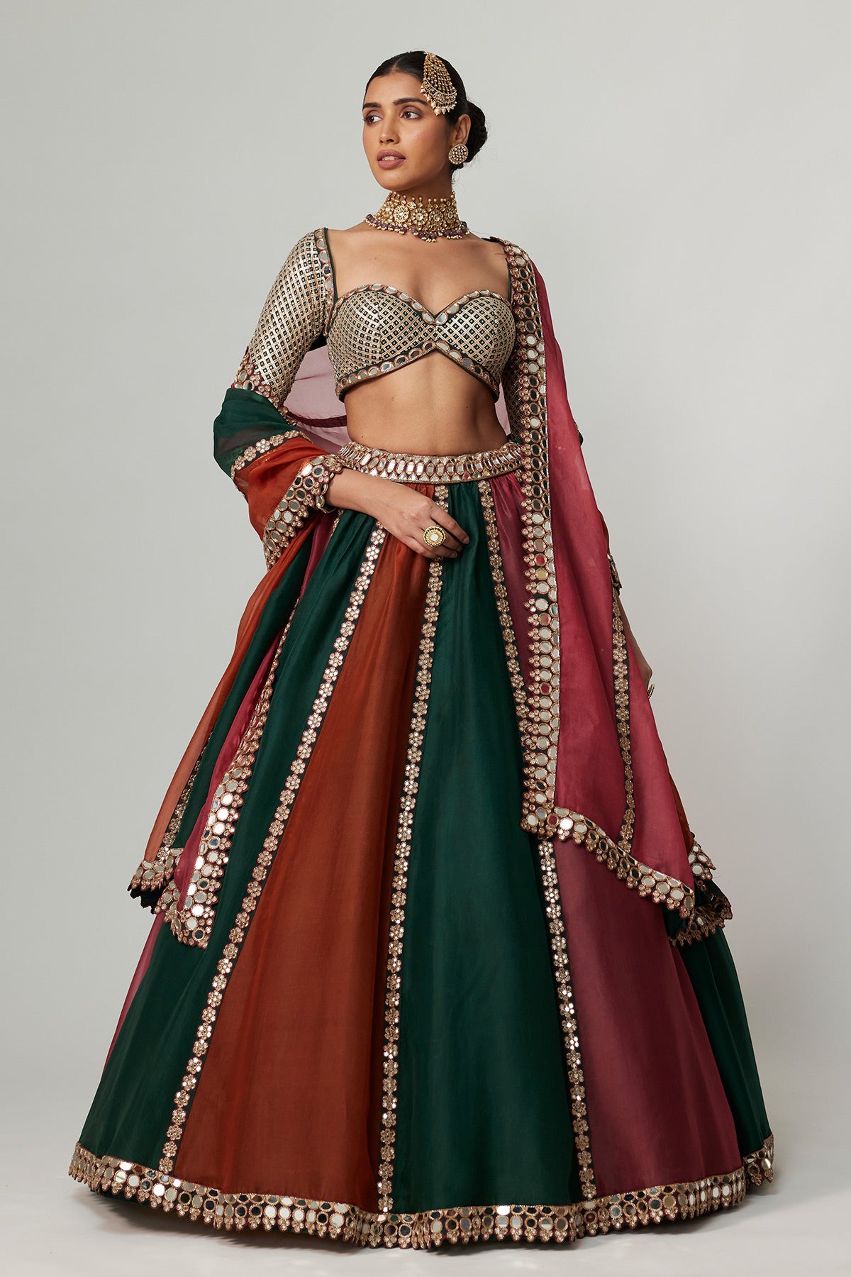 Cranberry Multicolor Linear Lehenga With Sweetheart Full Sleeve Blouse.