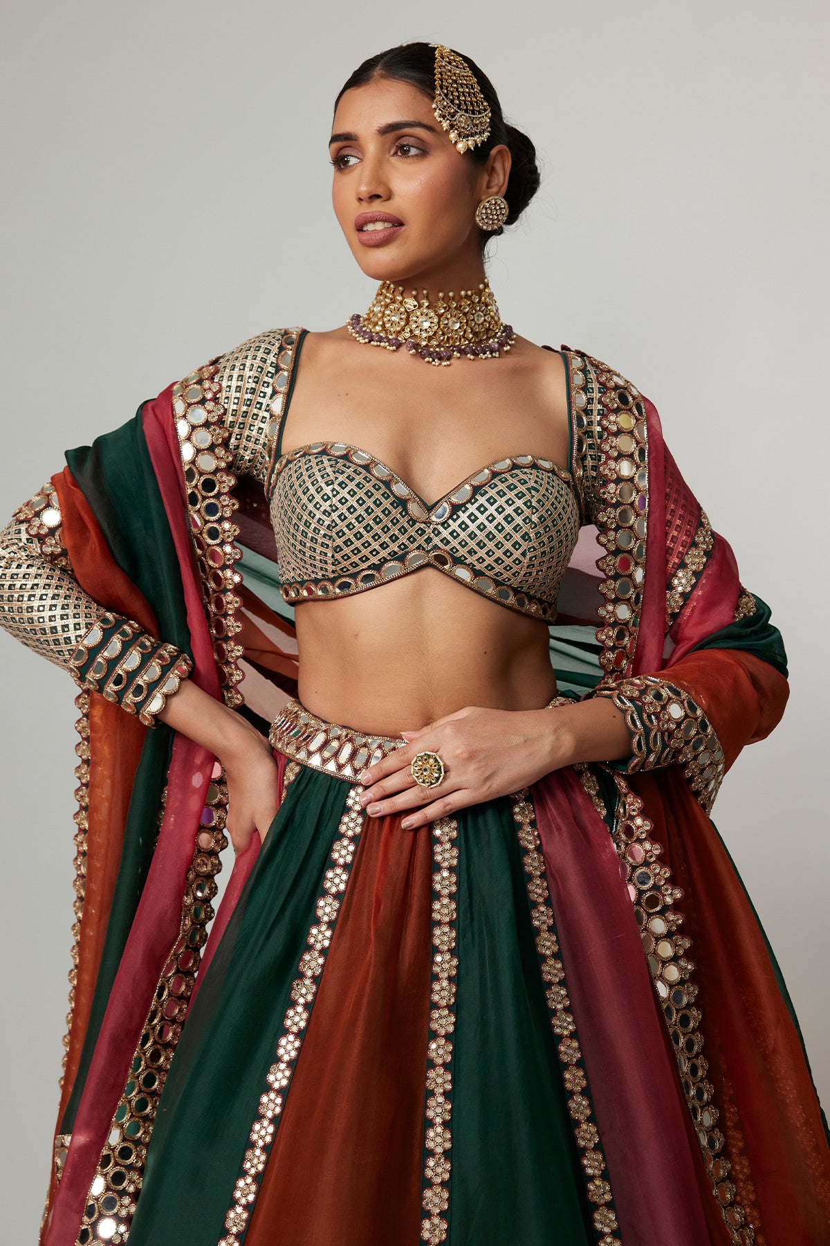 Cranberry Multicolor Linear Lehenga With Sweetheart Full Sleeve Blouse.