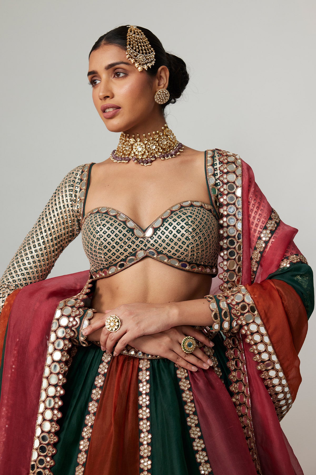 Cranberry Multicolor Linear Lehenga With Sweetheart Full Sleeve Blouse.