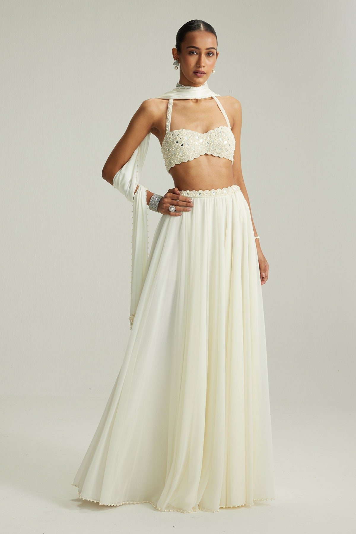 Off White Skirt Set With Halter Neck Blouse