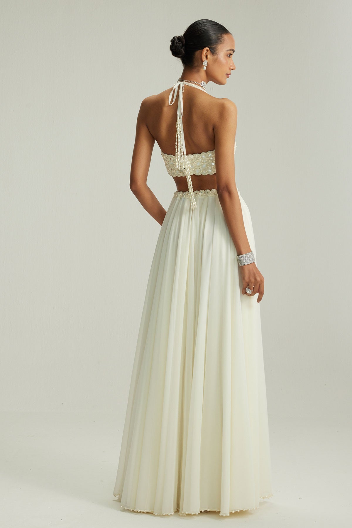 Off White Skirt Set With Halter Neck Blouse