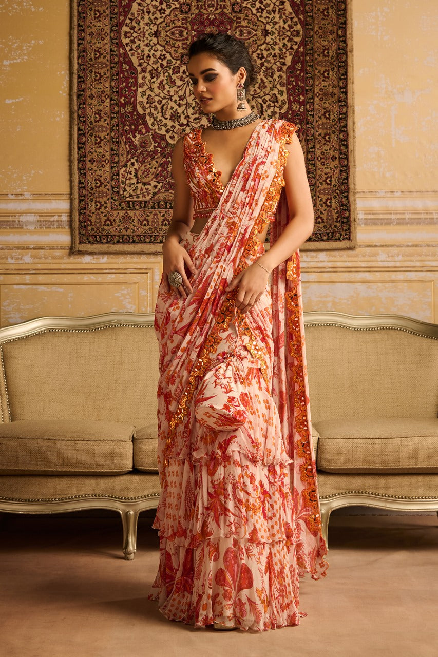 Orange print & embroidered blouse and skirt saree set