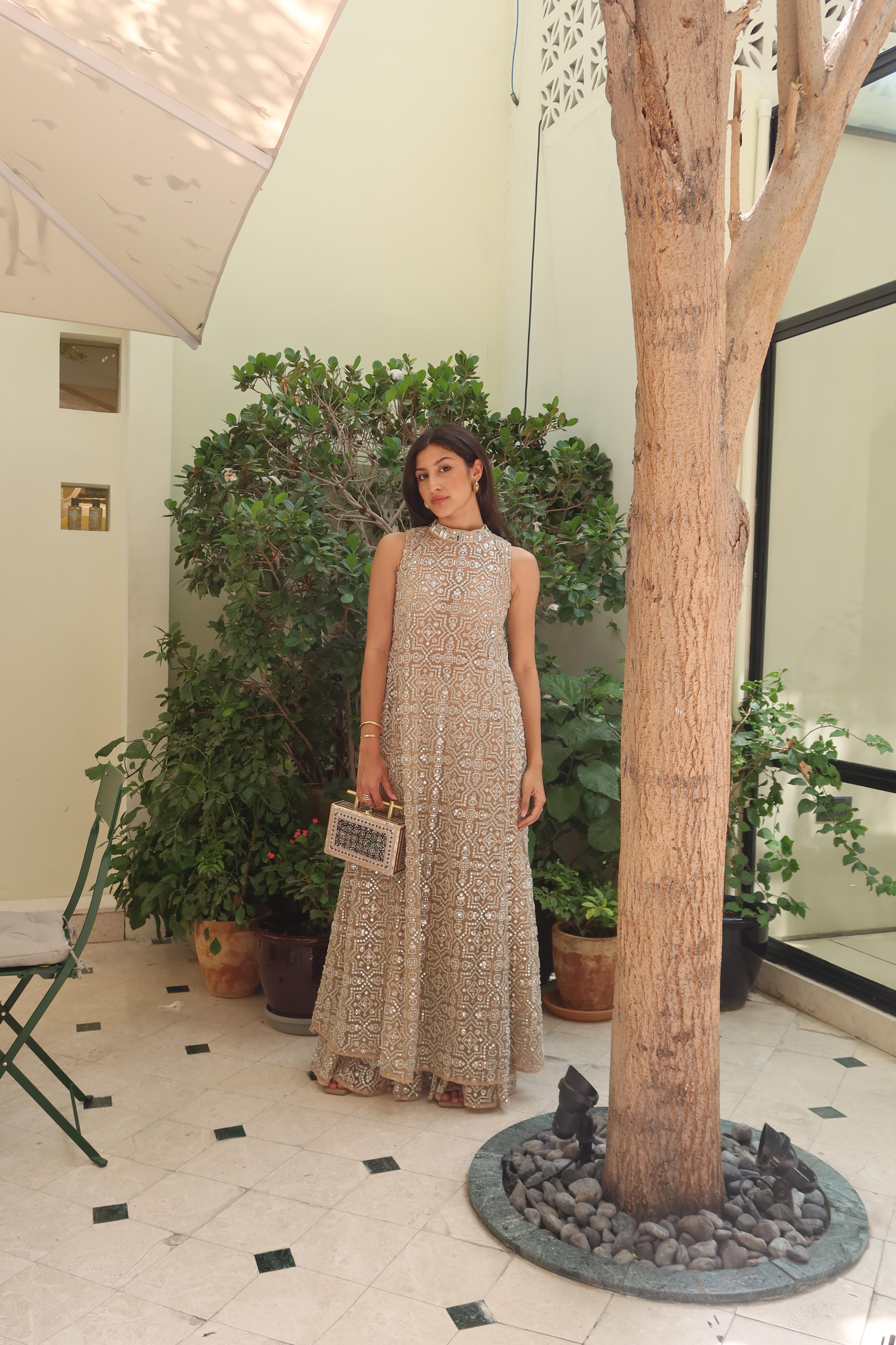 Afshaan in our Hi Neck Long Sleeveless Dress and Sharara Set