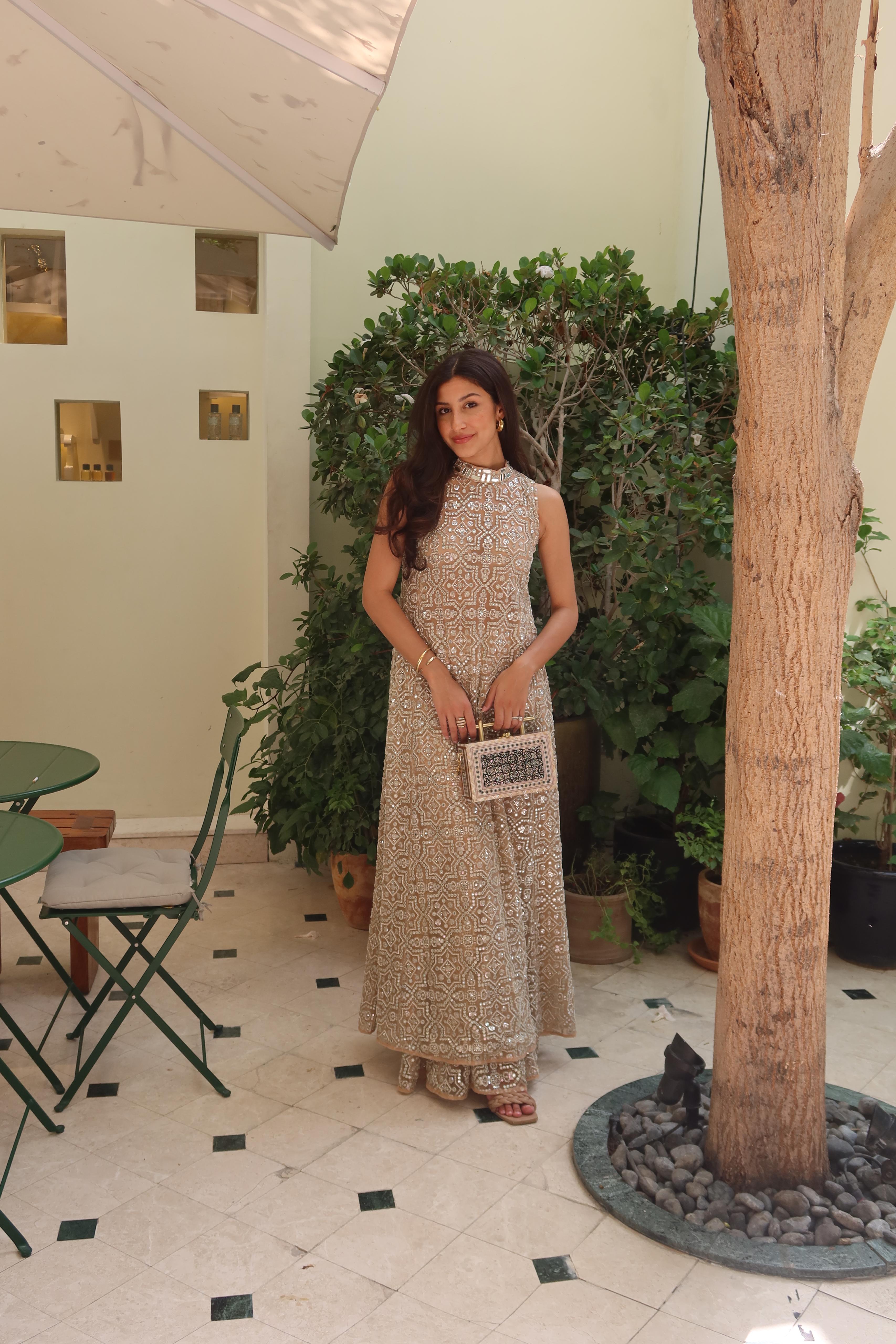 Afshaan in our Hi Neck Long Sleeveless Dress and Sharara Set