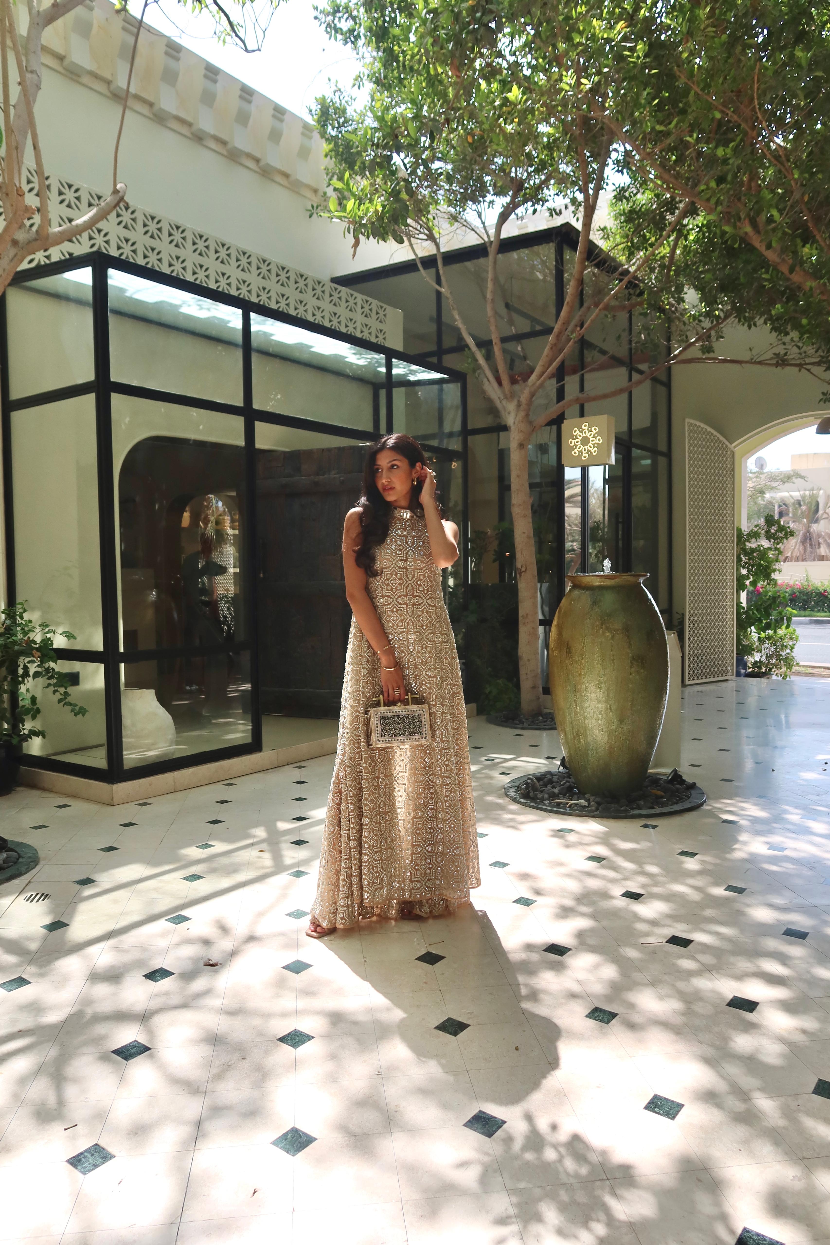Afshaan in our Hi Neck Long Sleeveless Dress and Sharara Set