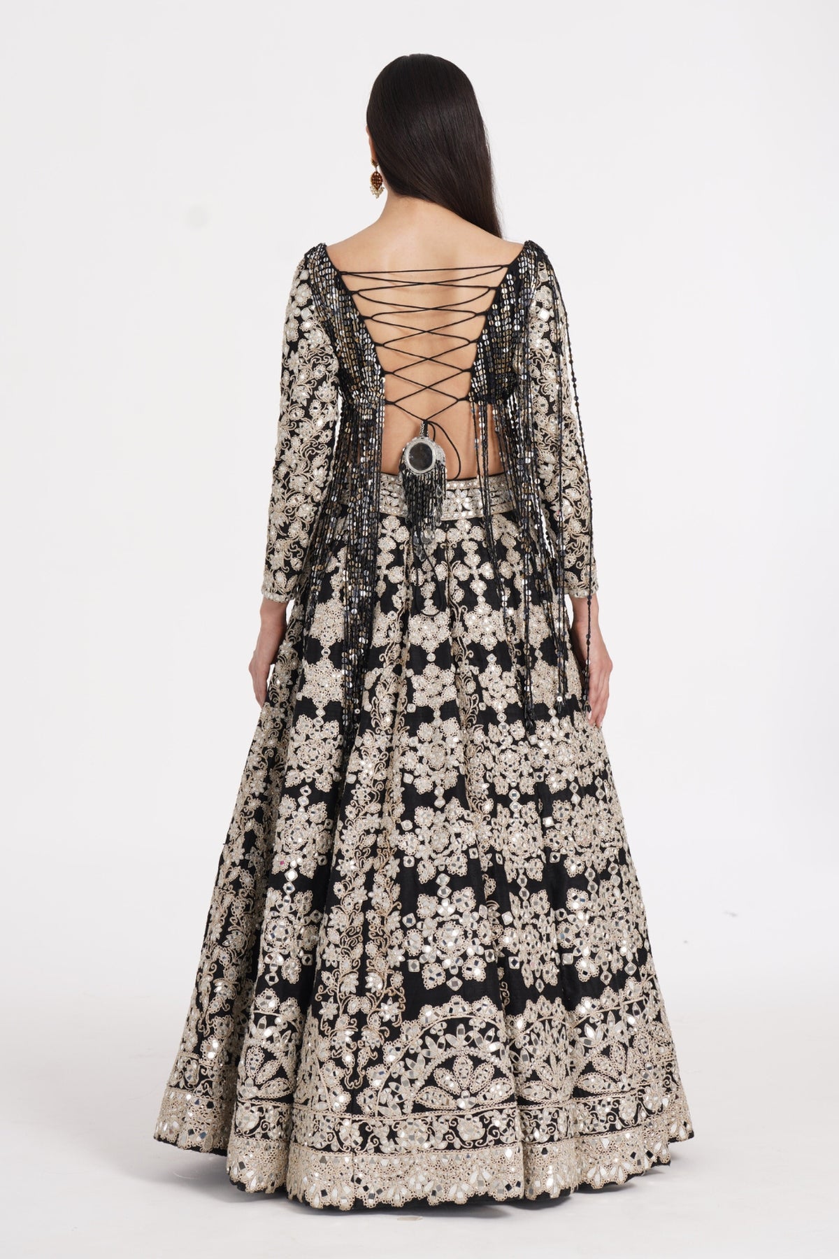 Jet black lehenga set embellished using ivory details