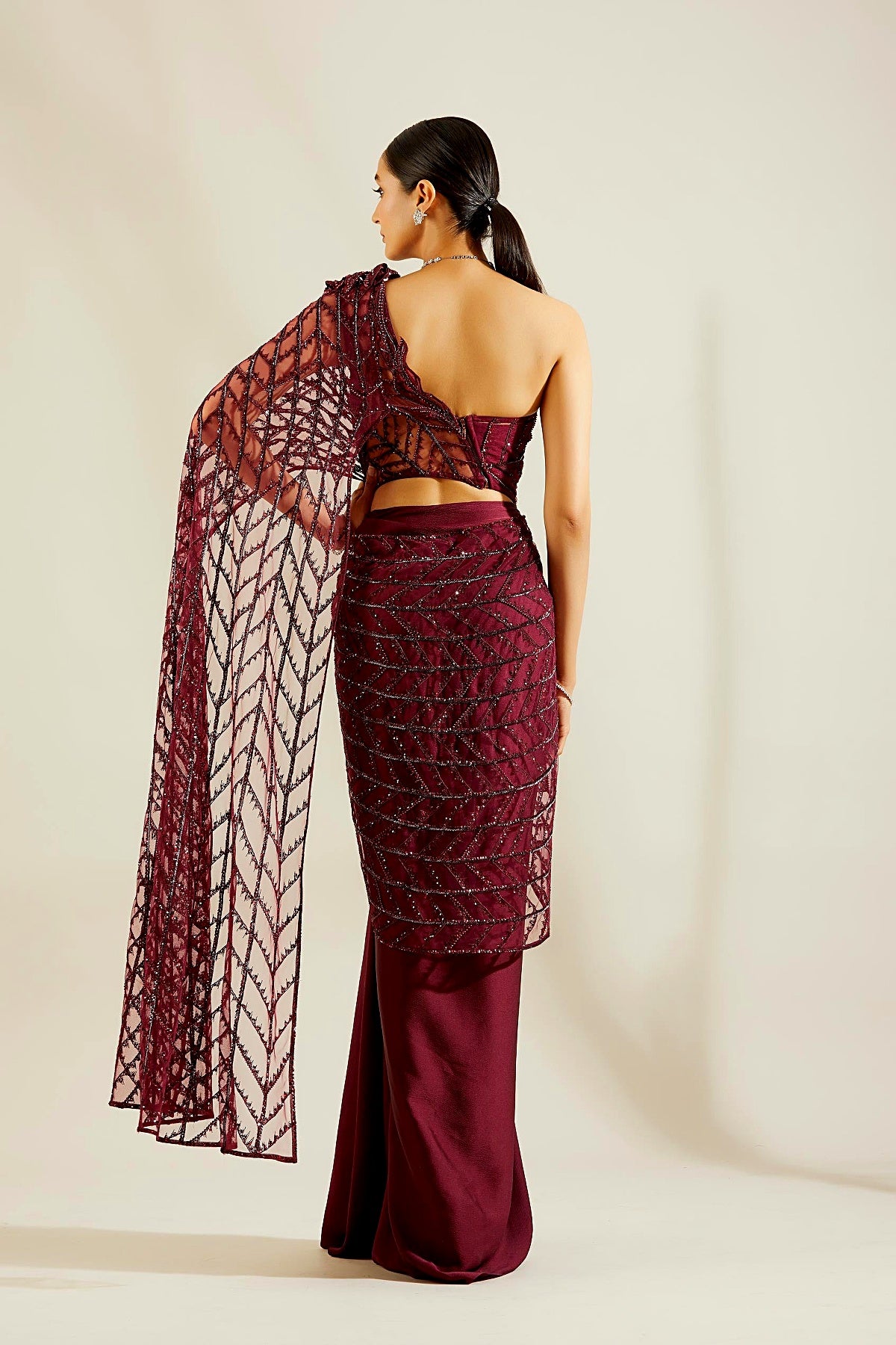 Bahaar Dhawan in Wine Crystal Drape Saree