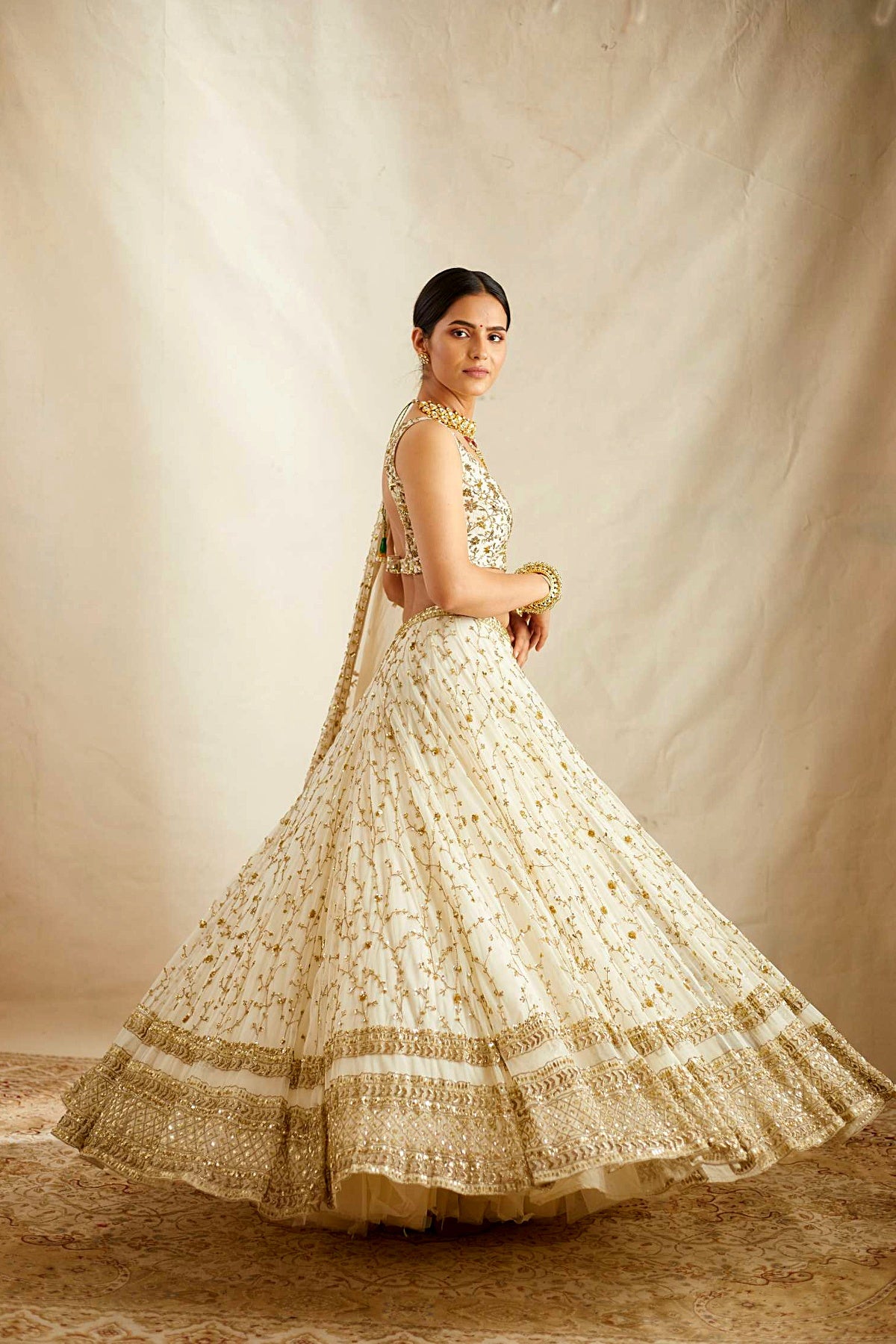 Off White Heavy Jaal Work Lehenga Set