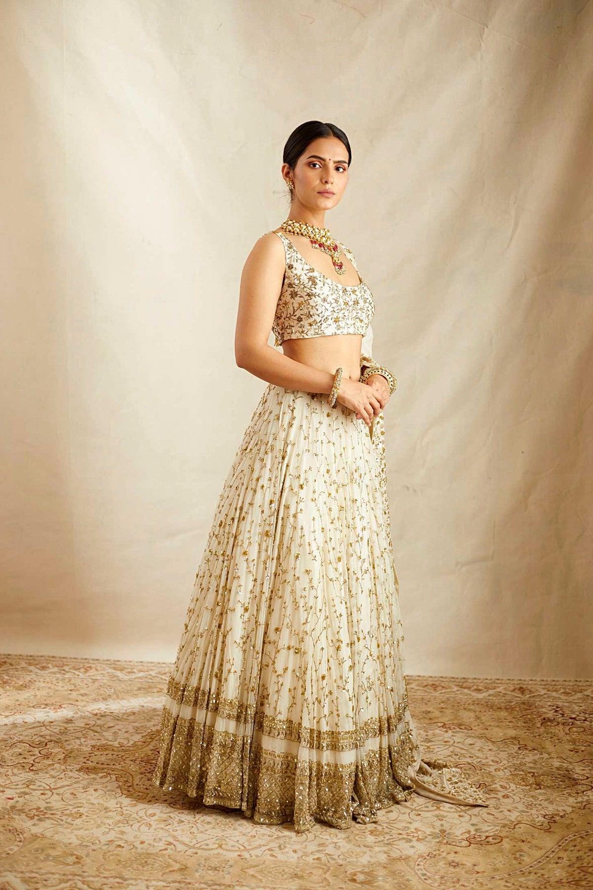 Off White Heavy Jaal Work Lehenga Set