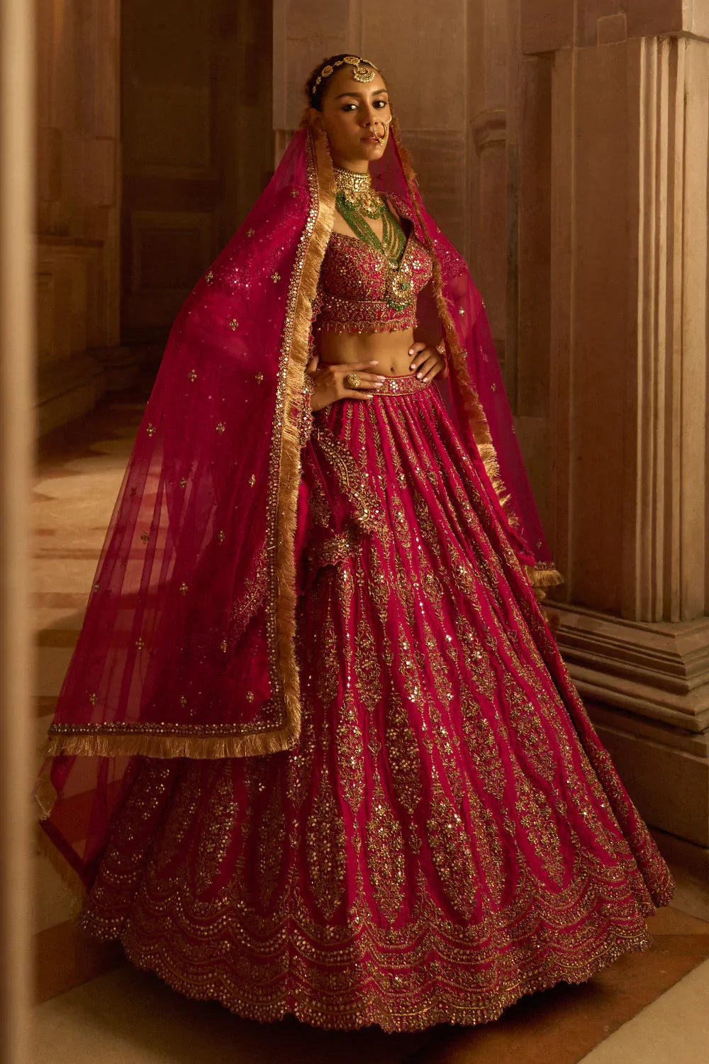 FUCHSIA RED RAW SILK BRIDAL LEHENGA CHOLI WITH A TULLE DUPATTA