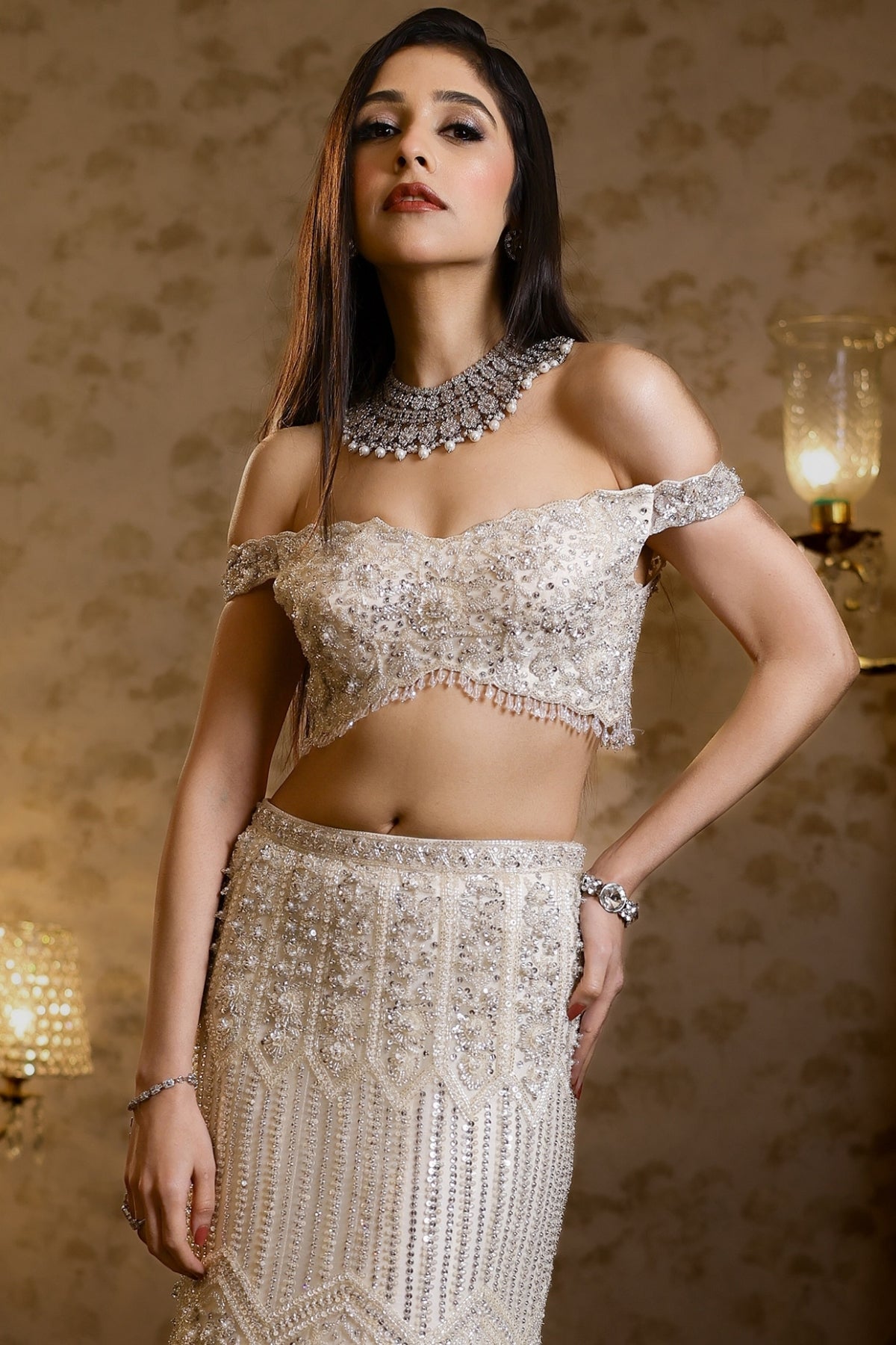 Ivory Net Hand Embroidered Fish-Cut Lehenga Set