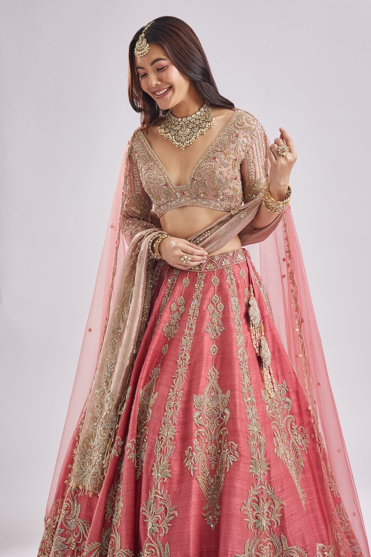 Scalloped Pink Lehenga With Dual Blouses