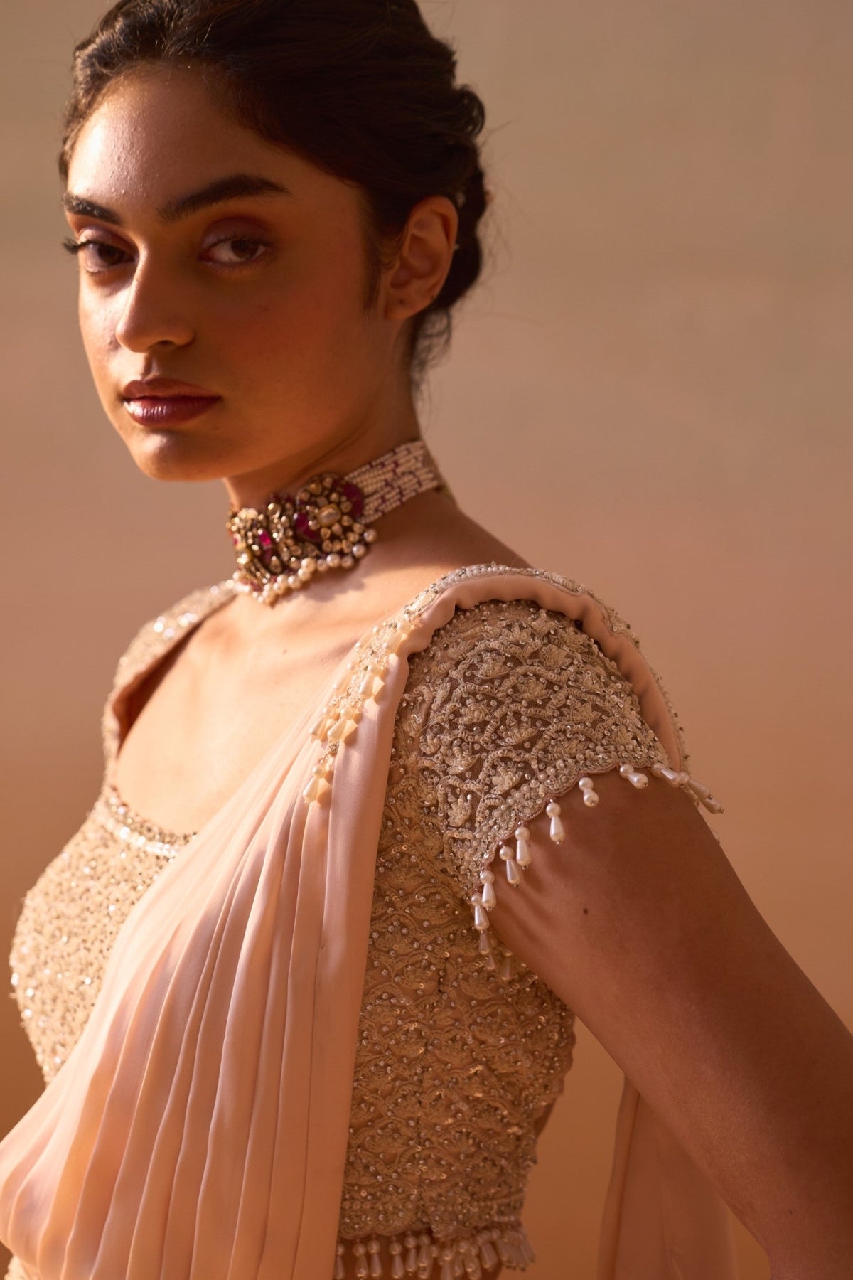 PEACH DRAPED SAREE