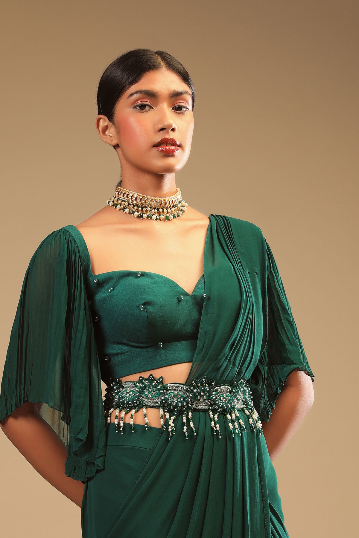 Emerald Green Ready To Wear Saree In Georgette With Bell Sleeves Crop Top And Chunky Embroidered Belt