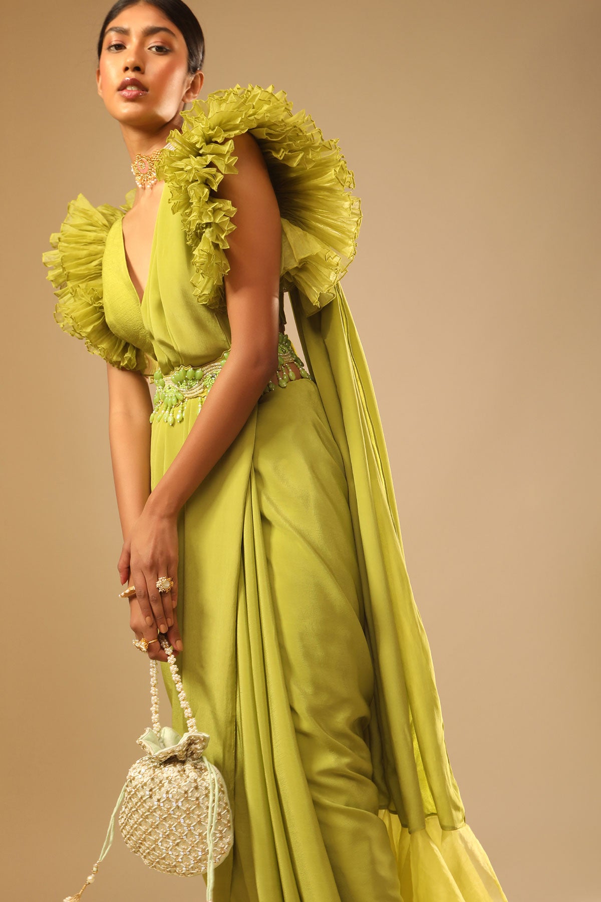 Lime Green Saree In Crepe With Elaborate Ruffle Sleeved Crop Top And Heavy Stone Embroidered Belt