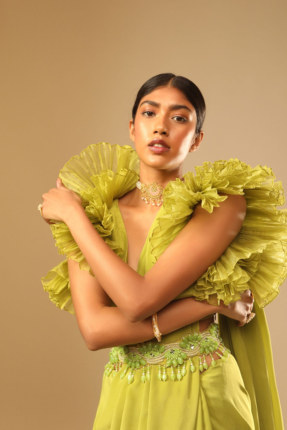 Lime Green Saree In Crepe With Elaborate Ruffle Sleeved Crop Top And Heavy Stone Embroidered Belt