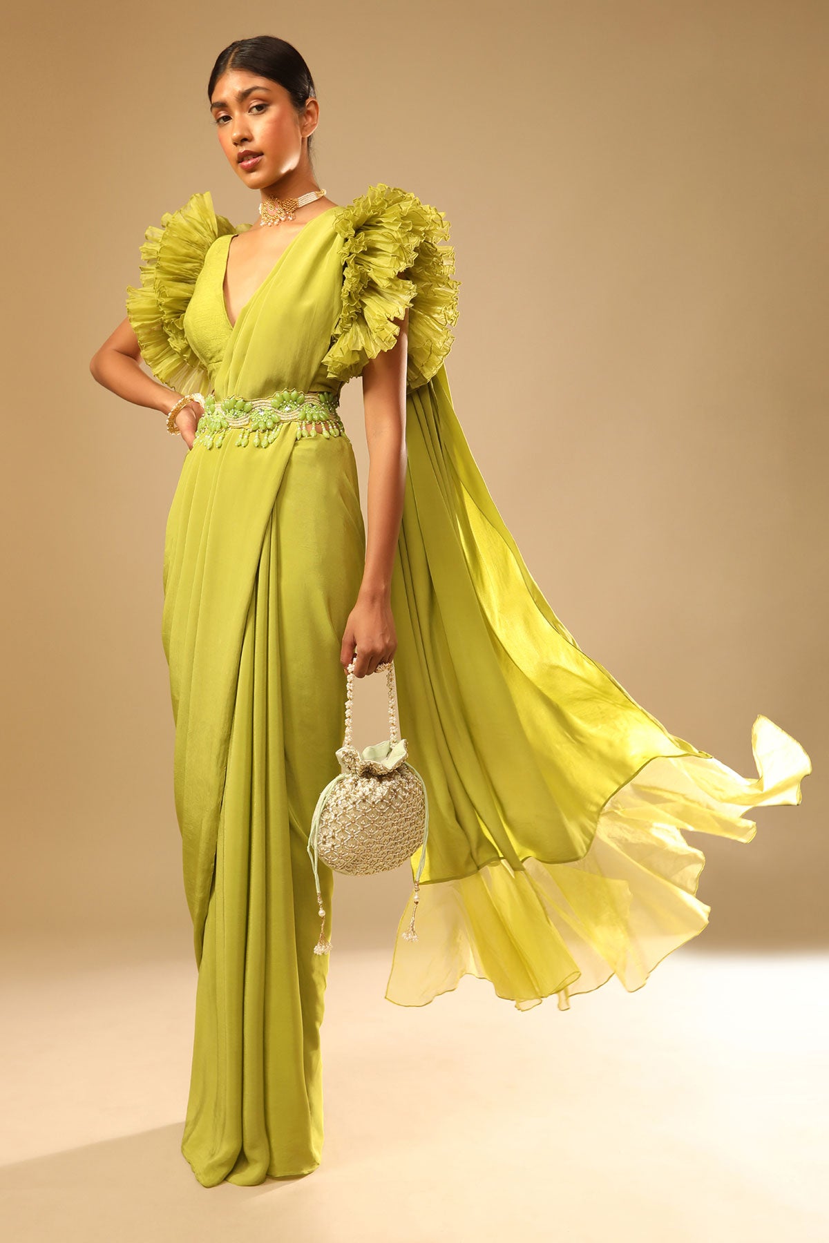 Lime Green Saree In Crepe With Elaborate Ruffle Sleeved Crop Top And Heavy Stone Embroidered Belt