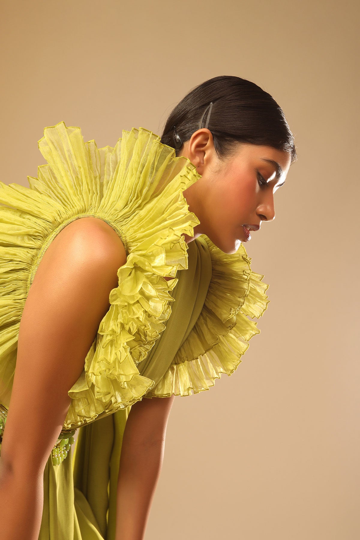 Lime Green Saree In Crepe With Elaborate Ruffle Sleeved Crop Top And Heavy Stone Embroidered Belt
