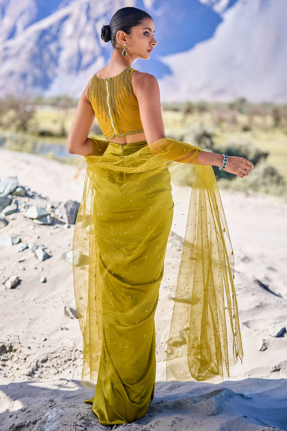 Green Satin Drape Skirt With Embroidered Blouse And Net Cape