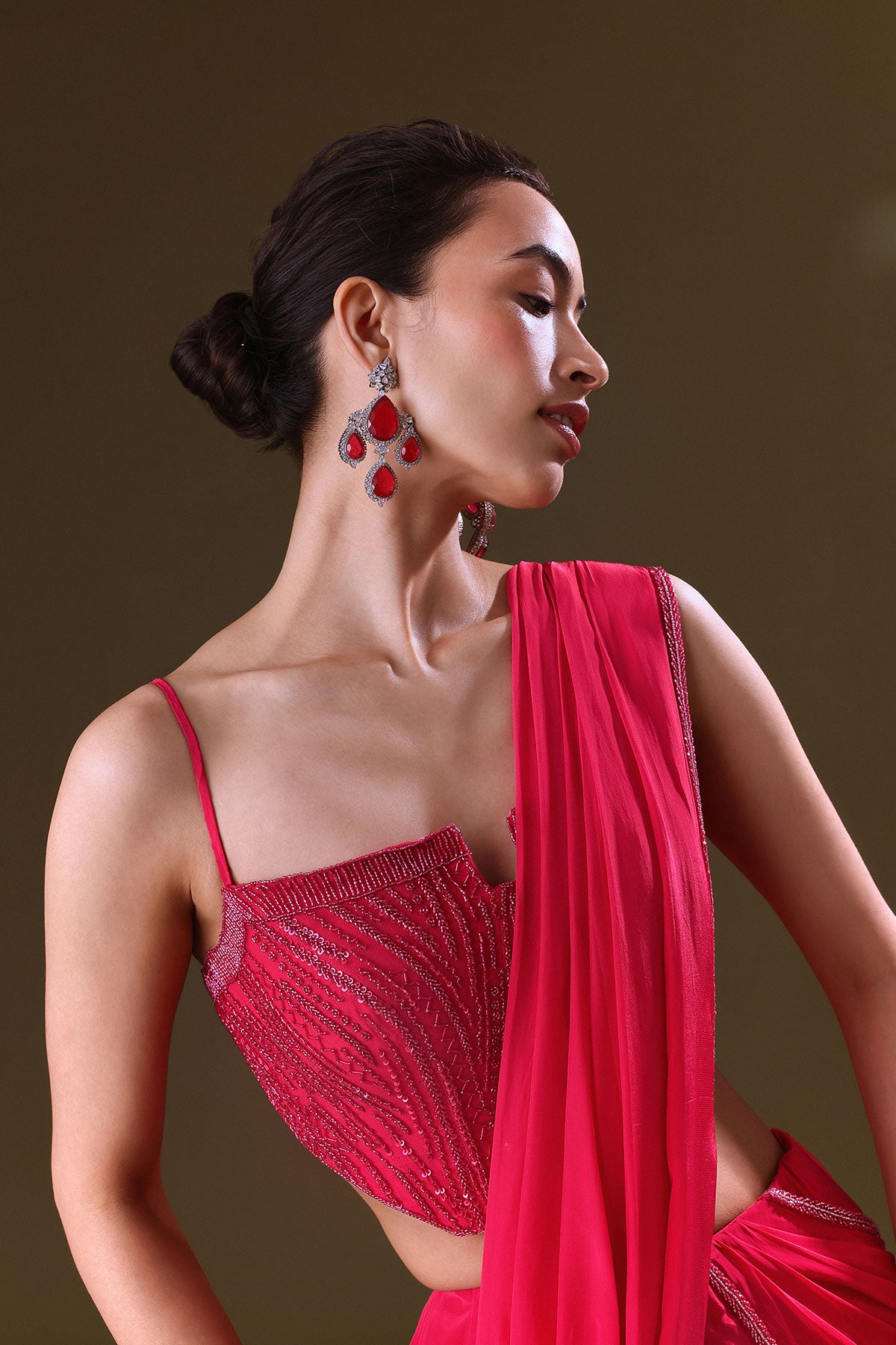 Reddish Pink Pre Stitched Draped Saree With Corset Fit Embroidered Blouse