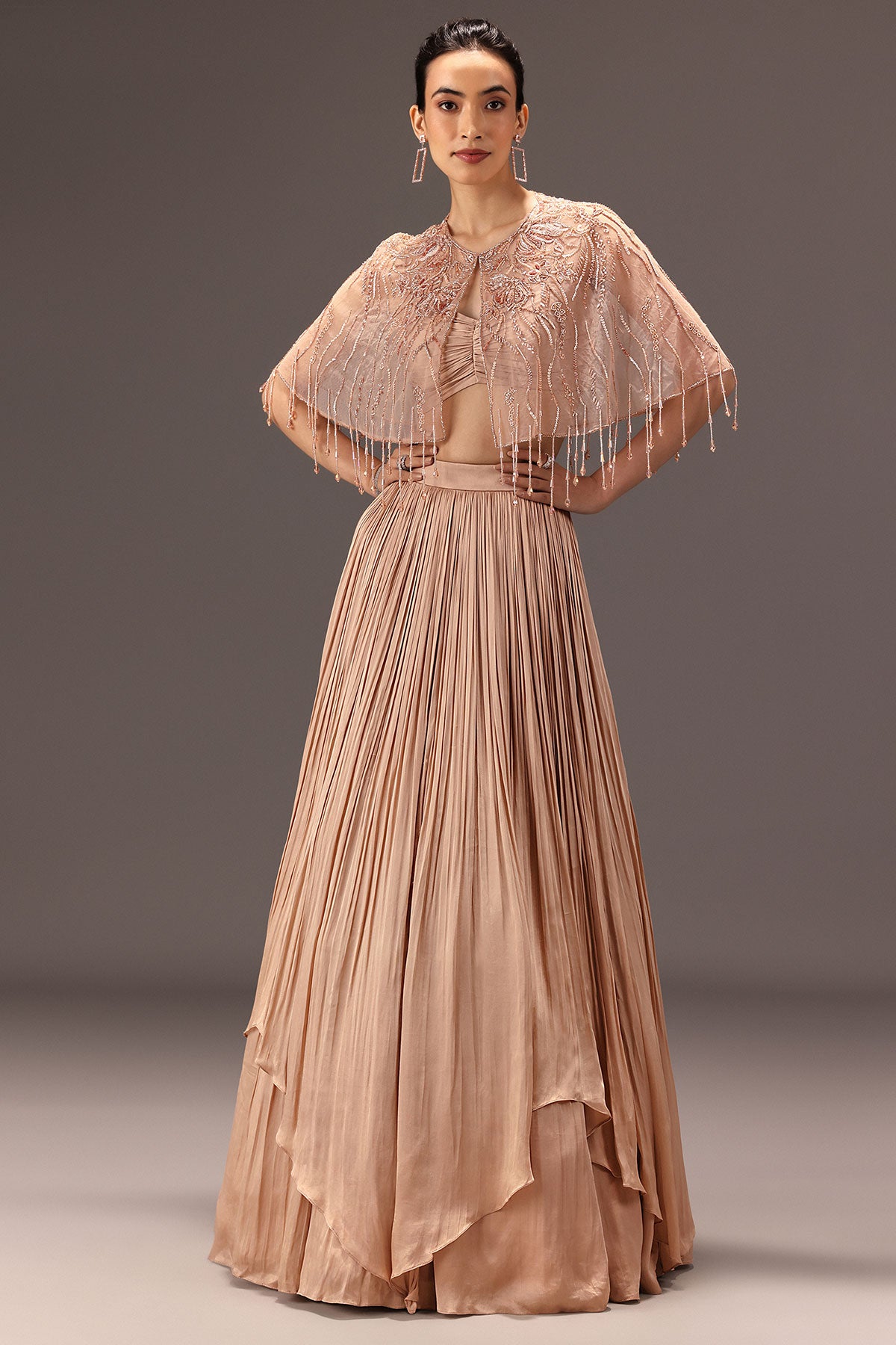 Nude Ruched Blouse With Cape And Layered Skirt