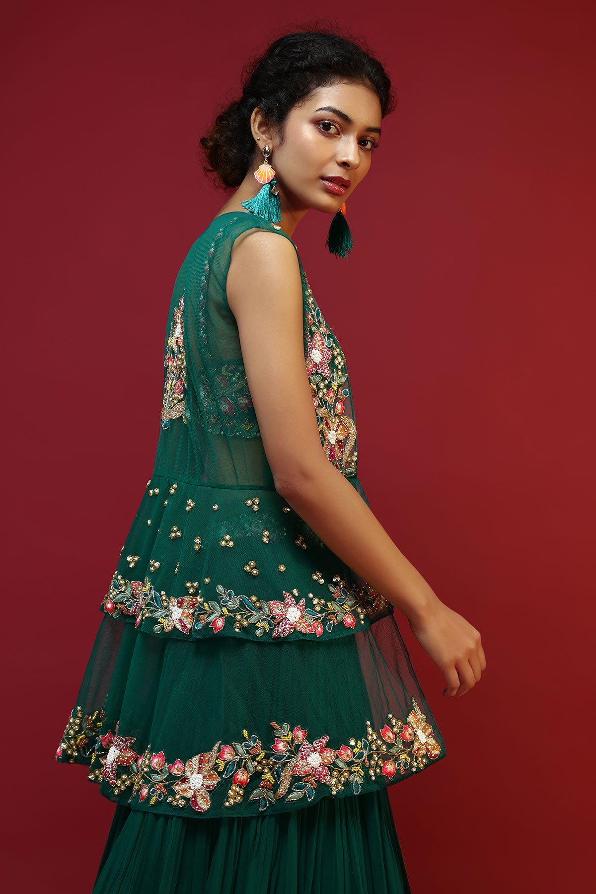 Bottle Green Lehenga Choli And Sleeveless Peplum Jacket Adorned With Colorful Resham And Moti Embroidered Flowers