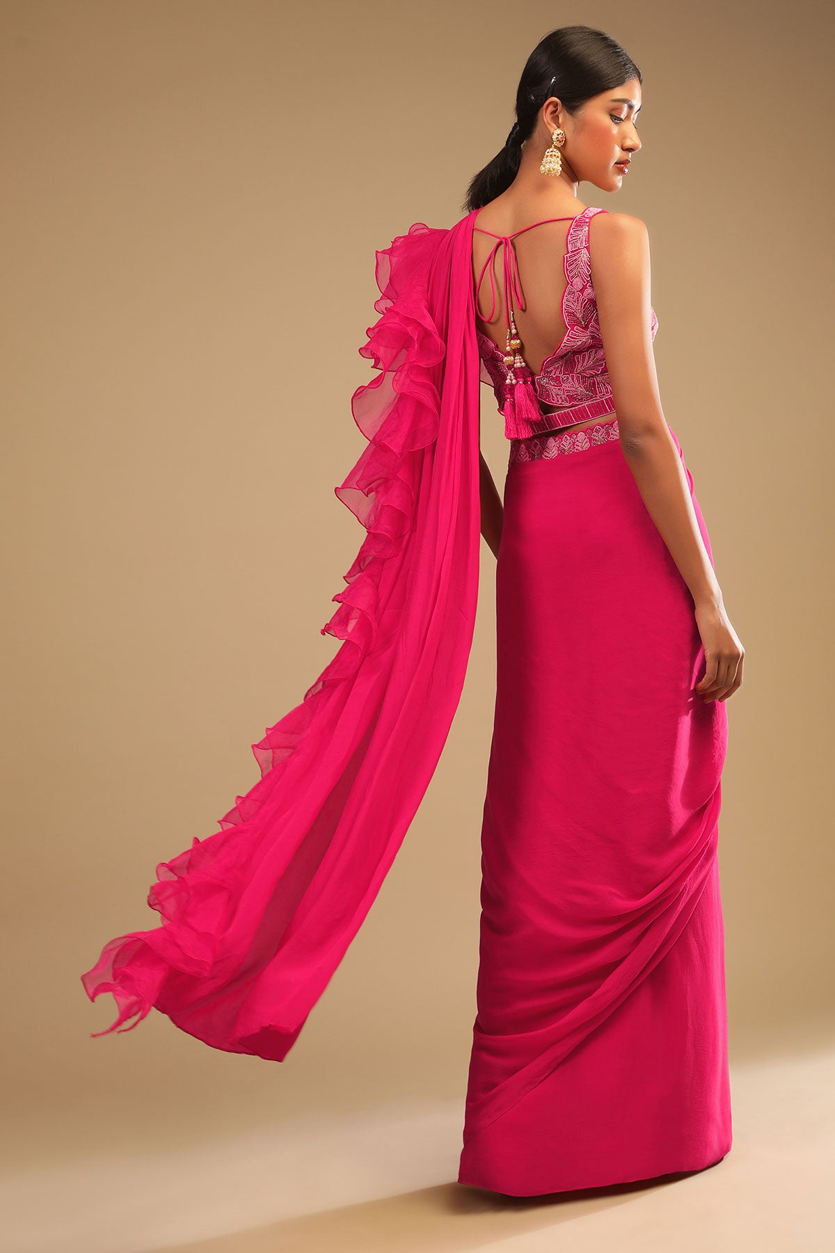 Hot Pink Readymade Saree In Crepe With Ruffle Frill On The Pallu And Beads Embroidered Crop Top And Belt