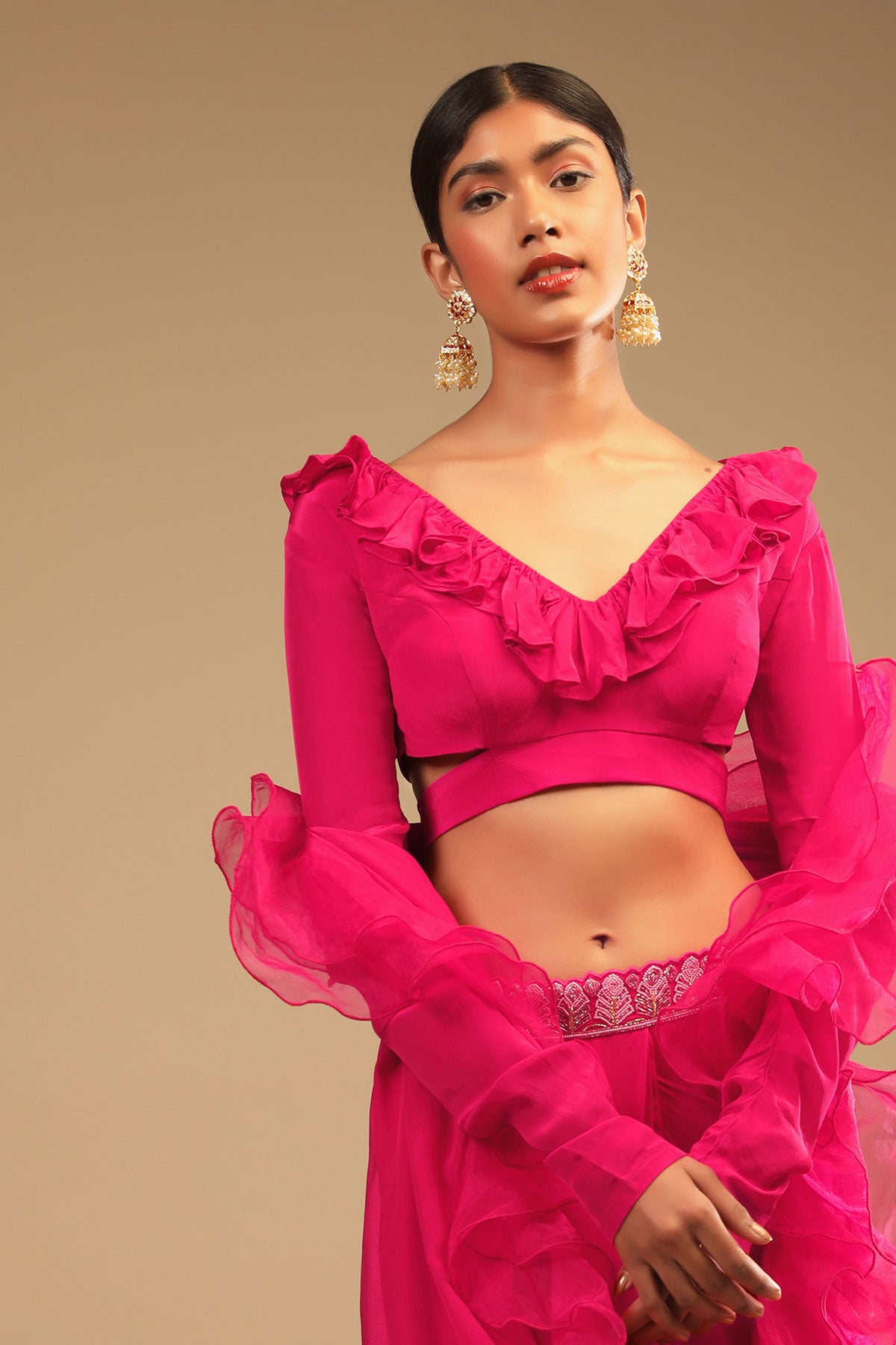Hot Pink Readymade Saree In Crepe With Ruffle Frill On The Pallu And Beads Embroidered Crop Top And Belt