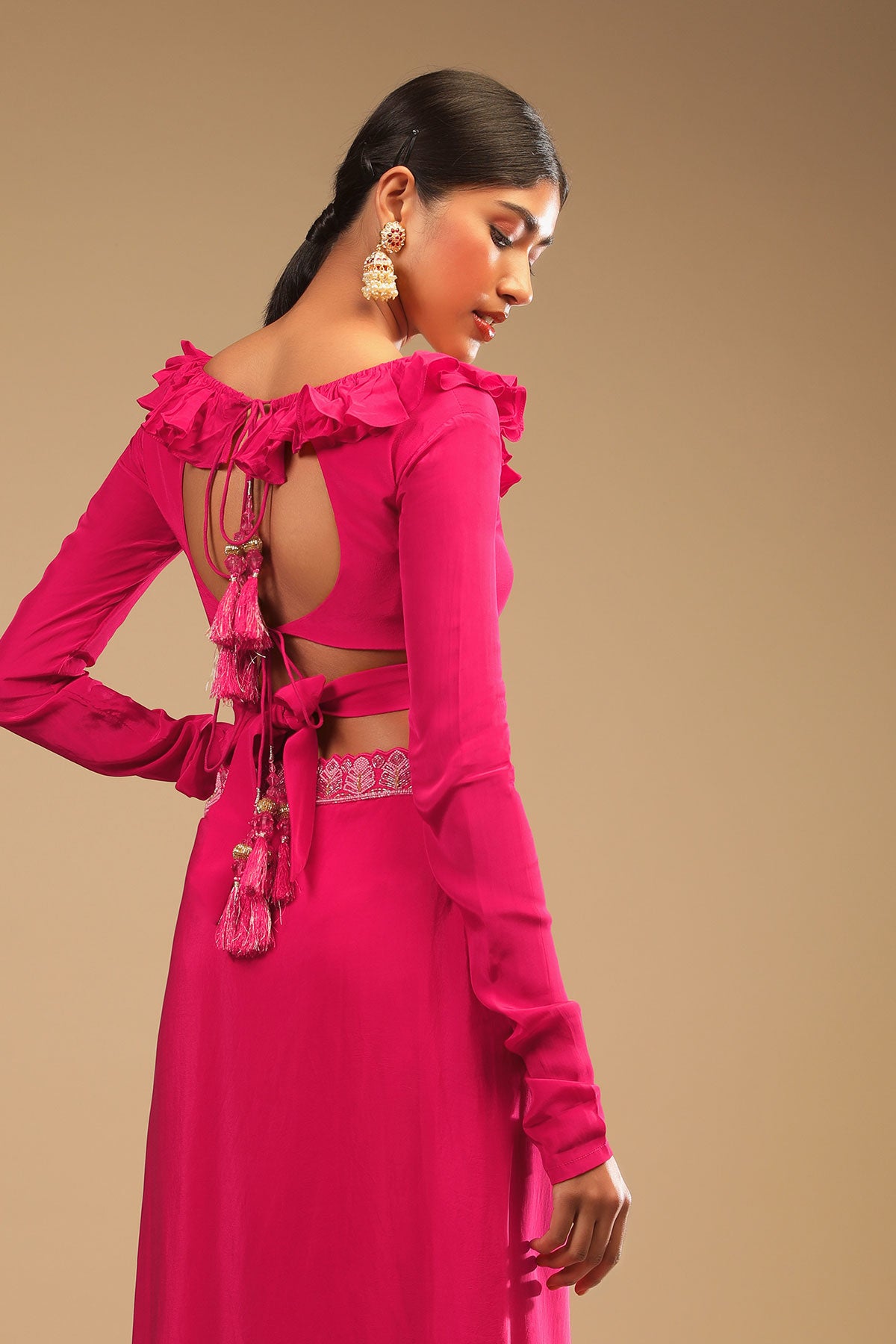 Hot Pink Readymade Saree In Crepe With Ruffle Frill On The Pallu And Beads Embroidered Crop Top And Belt
