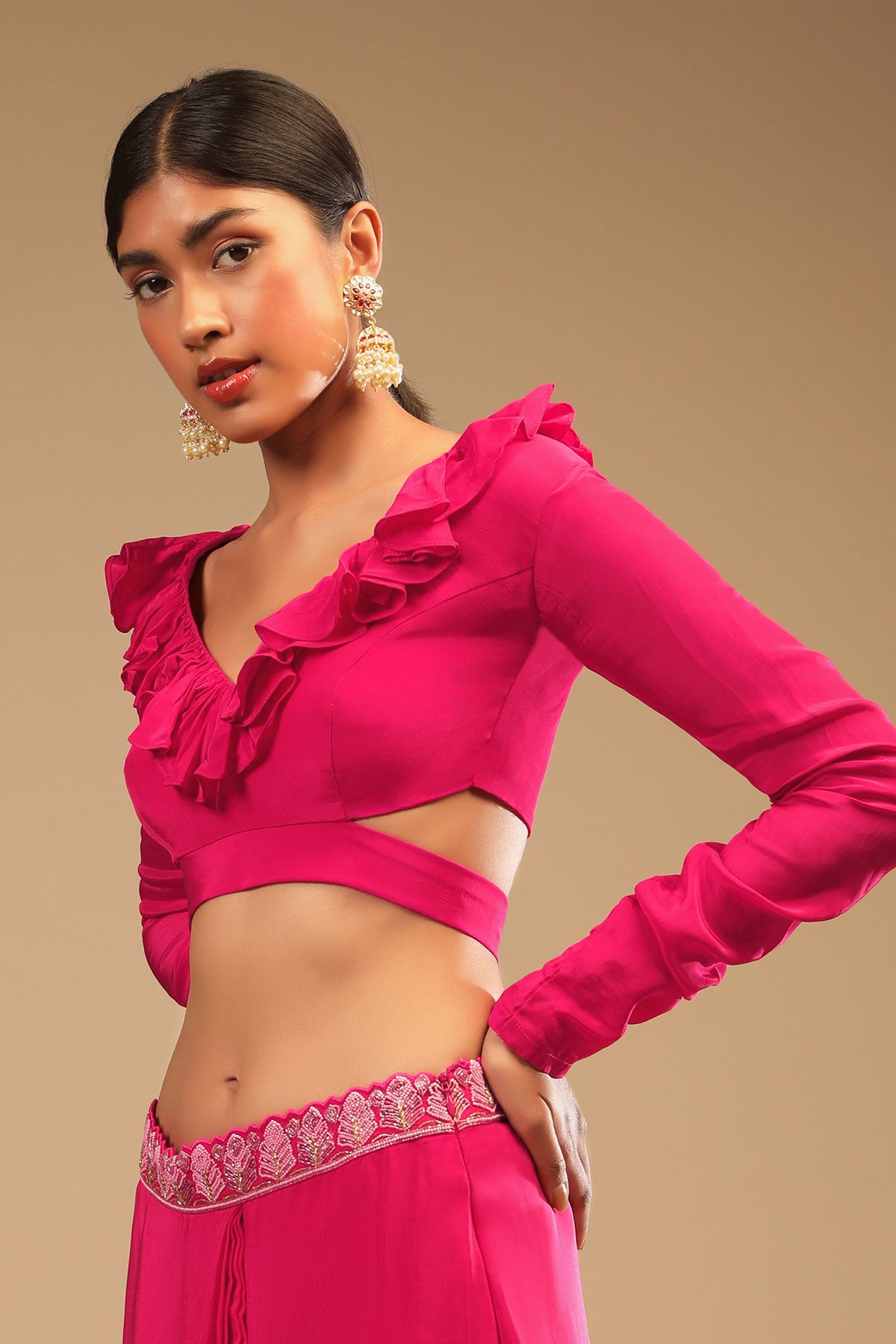 Hot Pink Readymade Saree In Crepe With Ruffle Frill On The Pallu And Beads Embroidered Crop Top And Belt