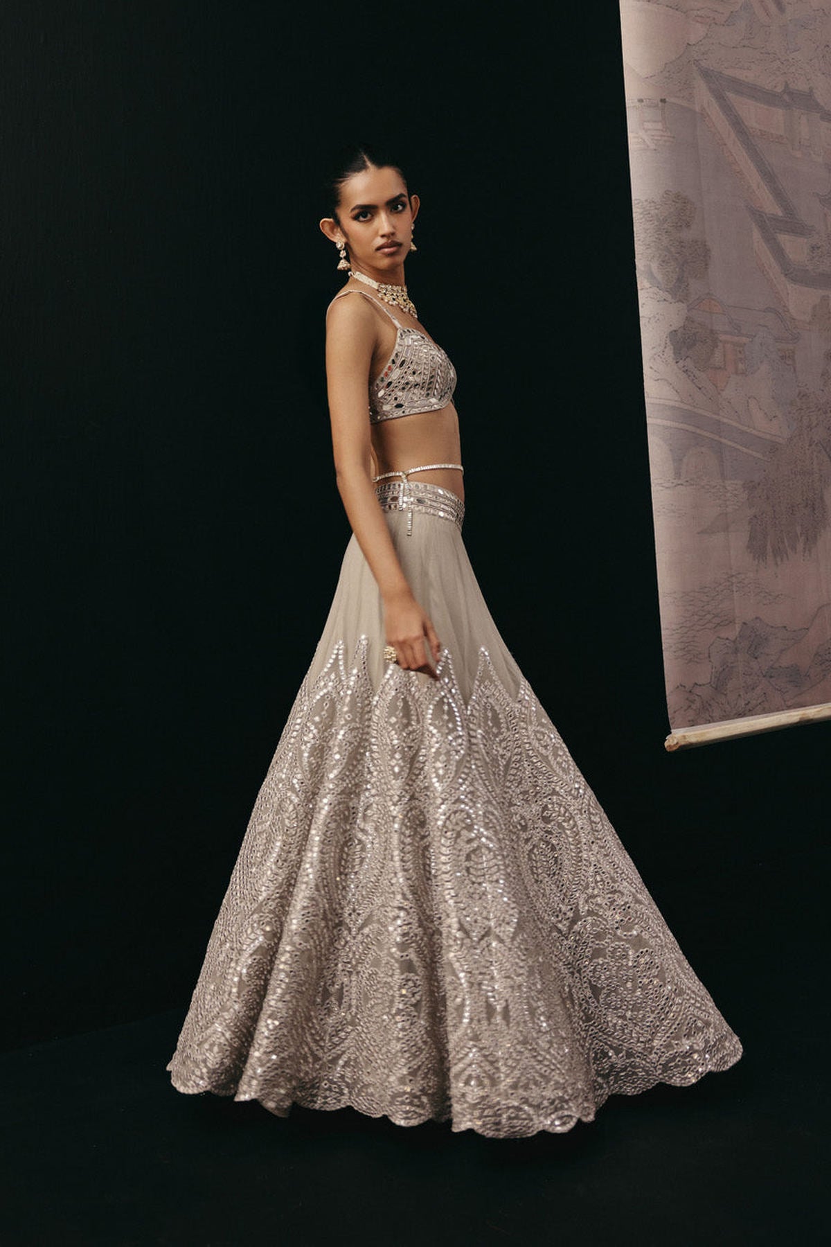 Silver Zari Mirrorwork Lehenga with Cape Sleeves Jacket and Bralette