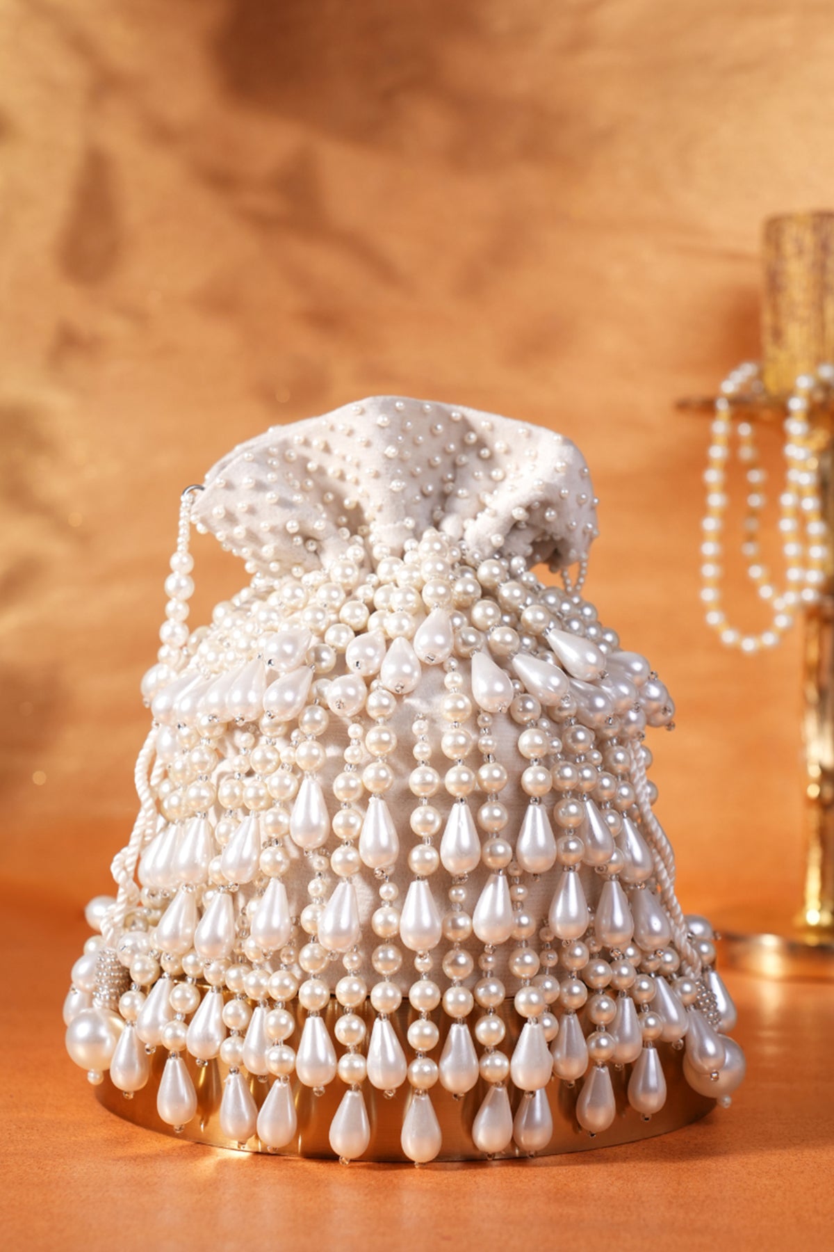 Zarah Ivory Pearl Suede Bucket Bag
