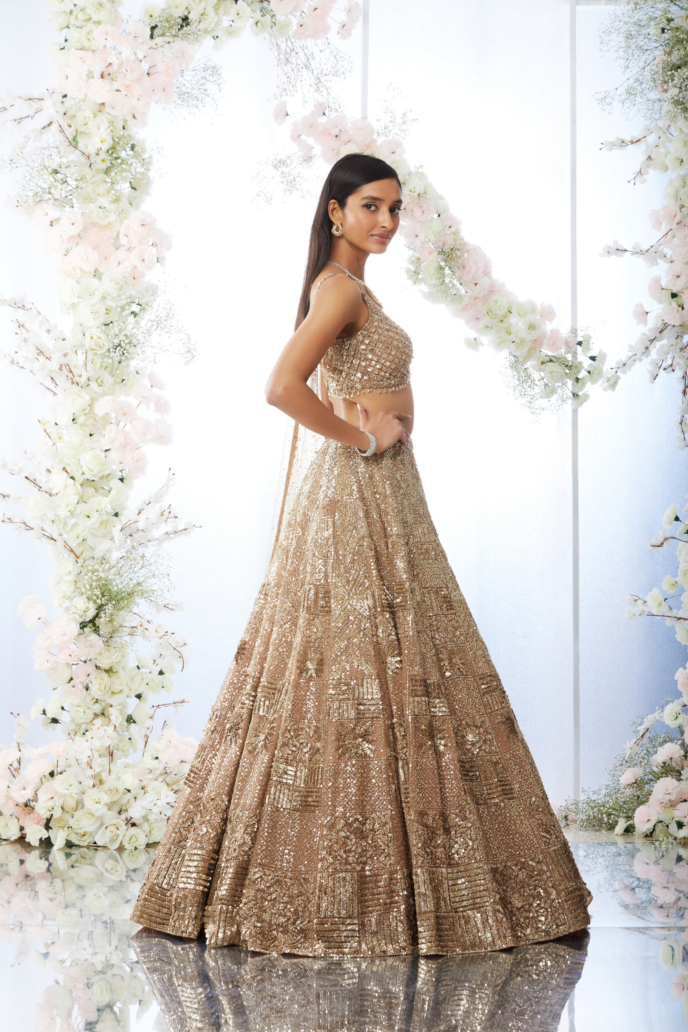 Vaani Kapoor in Biscotti Gold Sequin Lehenga Set