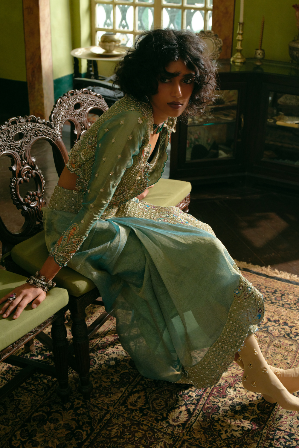 Turquoise silk zari tissue draped skirt with tube top and croped jacket