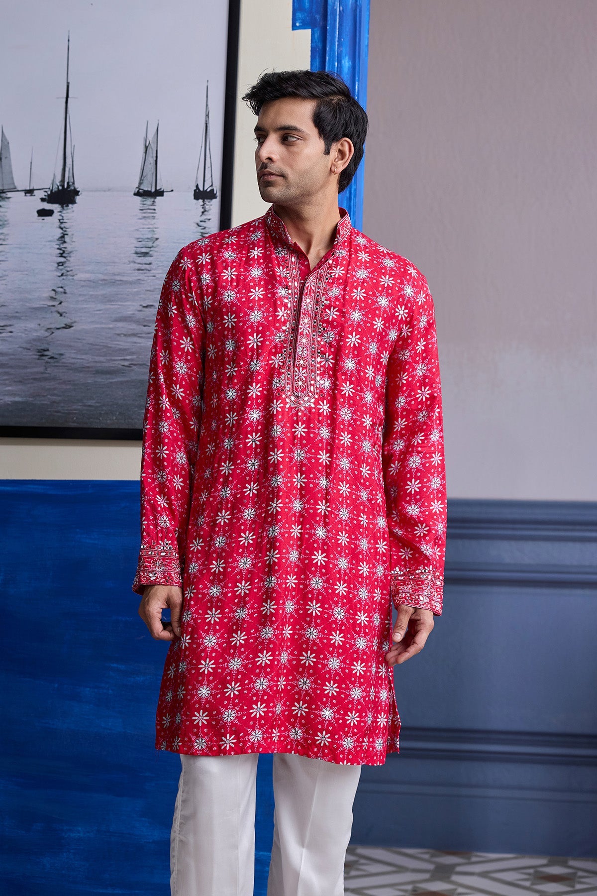 RED PRINT HIGHLIGHTED  KURTA WITH PRINT EMBROIDERED BUNDI AND IVORY PANTS