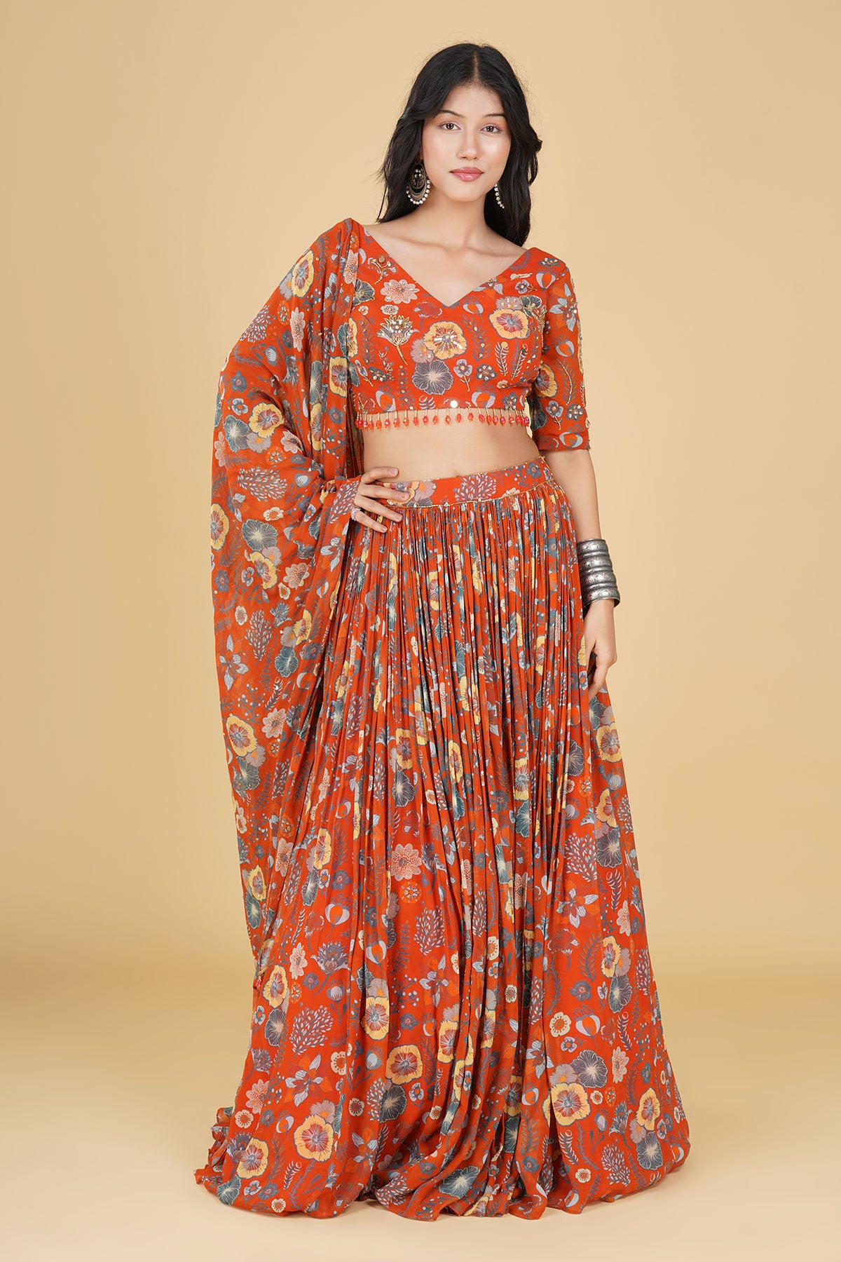 RUST ORANGE JAAL HIGHLIGHTED AND PRINTED LEHENGA SET
