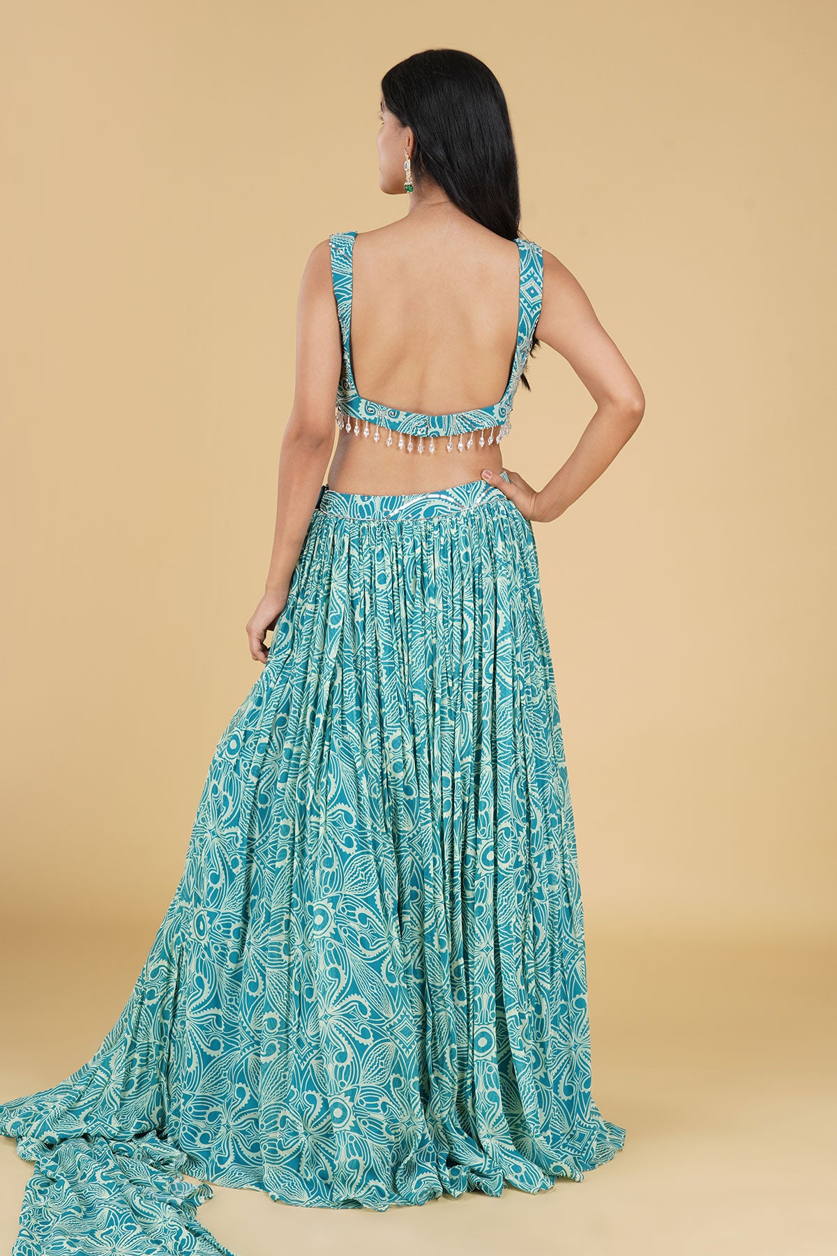 TURQUOISE JAAL HIGHLIGHTED AND PRINTED LEHENGA SET