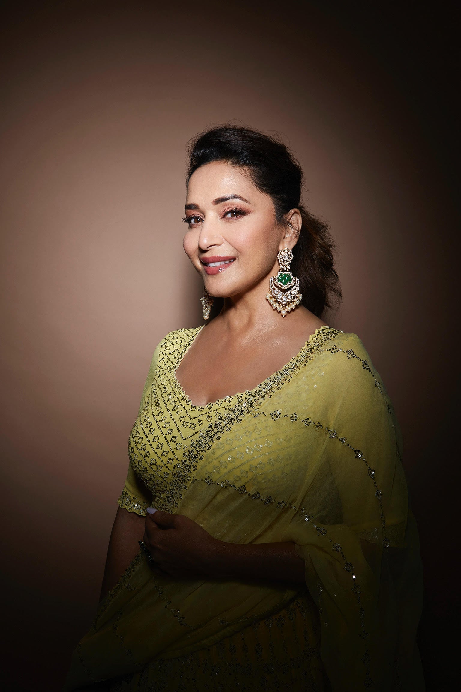 Madhuri Dixit In Yellow Multi-Tiered Lehenga Set