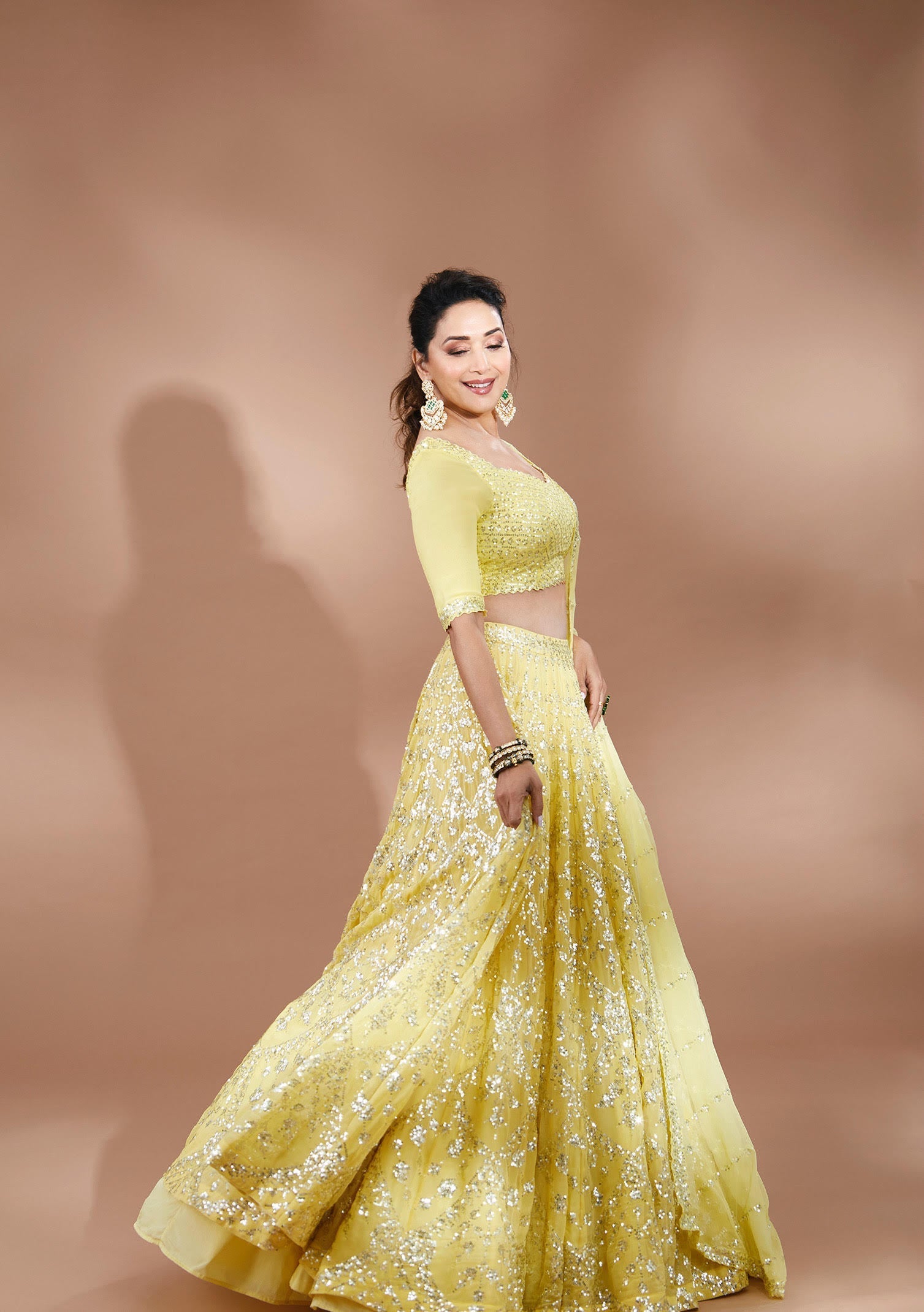 Madhuri Dixit In Yellow Multi-Tiered Lehenga Set