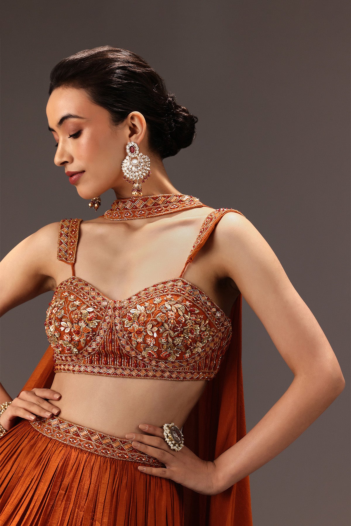 Burnt Rust Organza Hand Embellished Ruched Lehenga Set With Choker Dupatta
