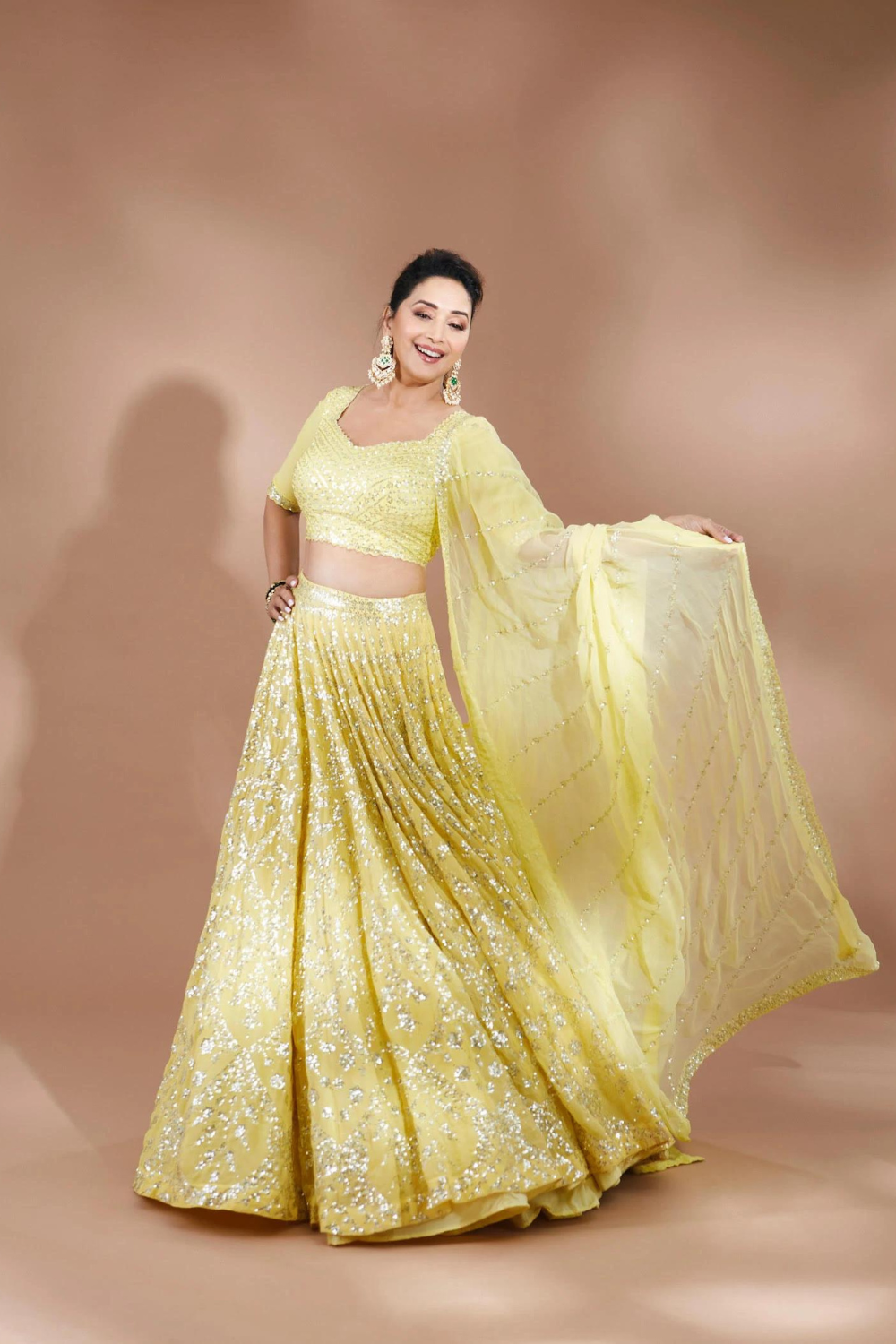 Madhuri Dixit In Yellow Multi-Tiered Lehenga Set