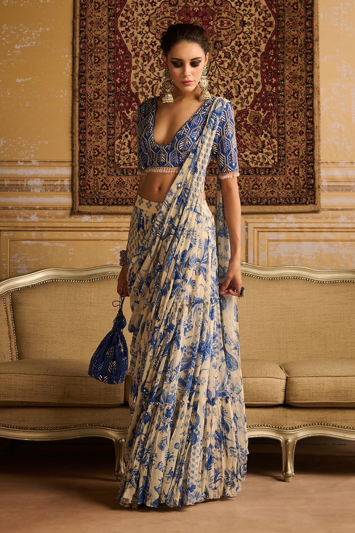 Blue highlighted blouse and  tiered saree set