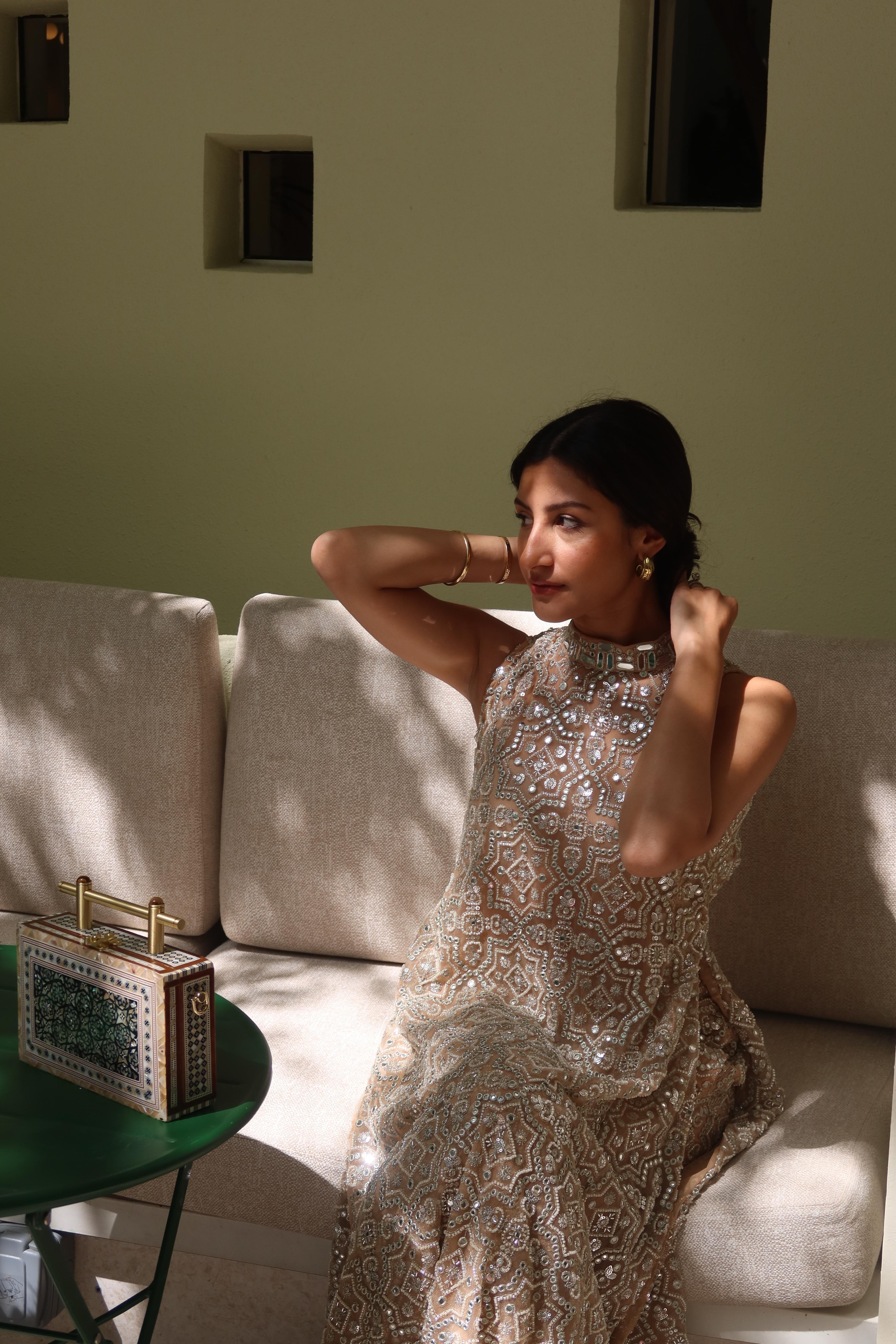 Afshaan in our Hi Neck Long Sleeveless Dress and Sharara Set